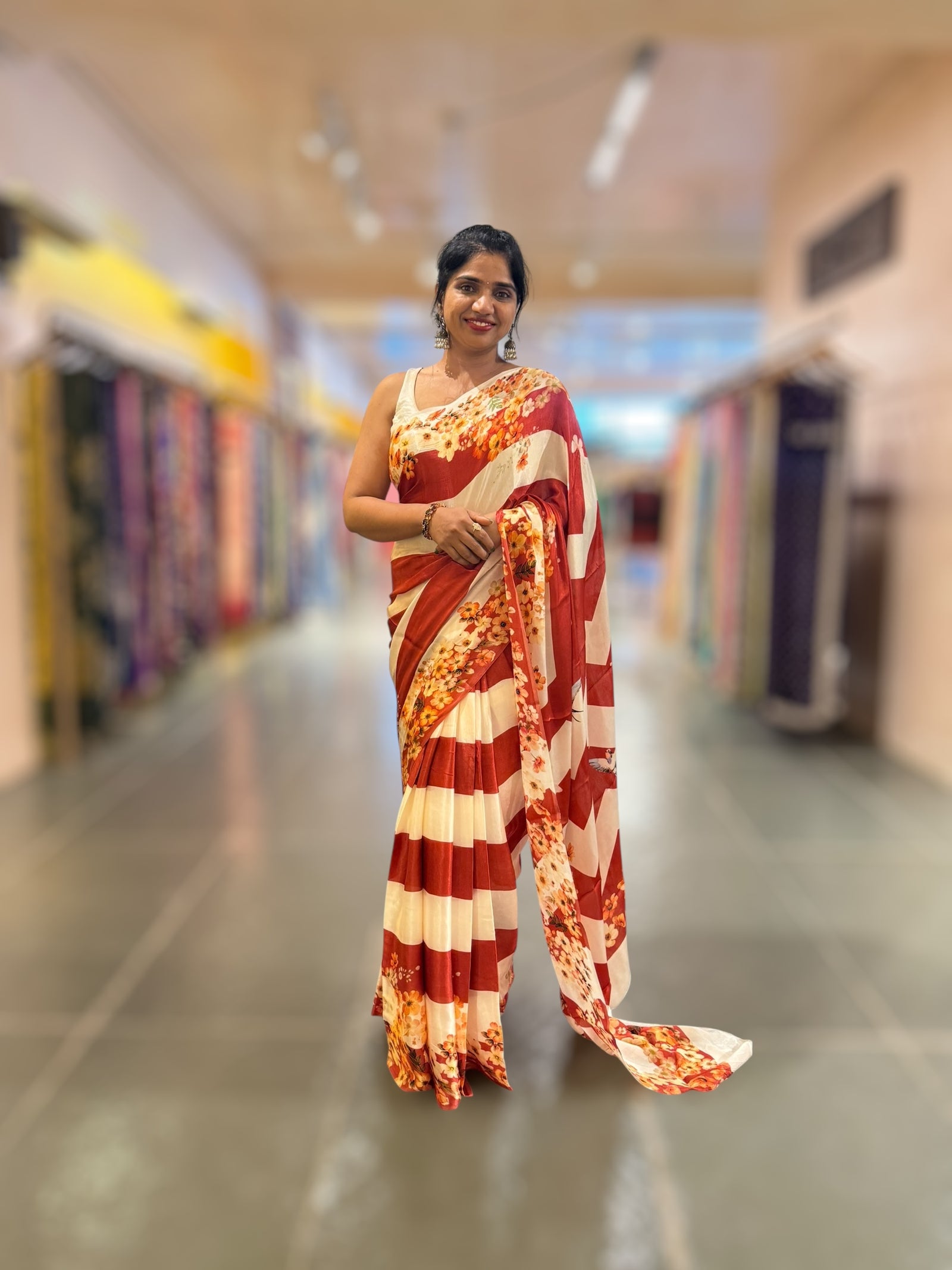 Trisha inspired Chinnon Silk Stripes & Floral Printed Saree