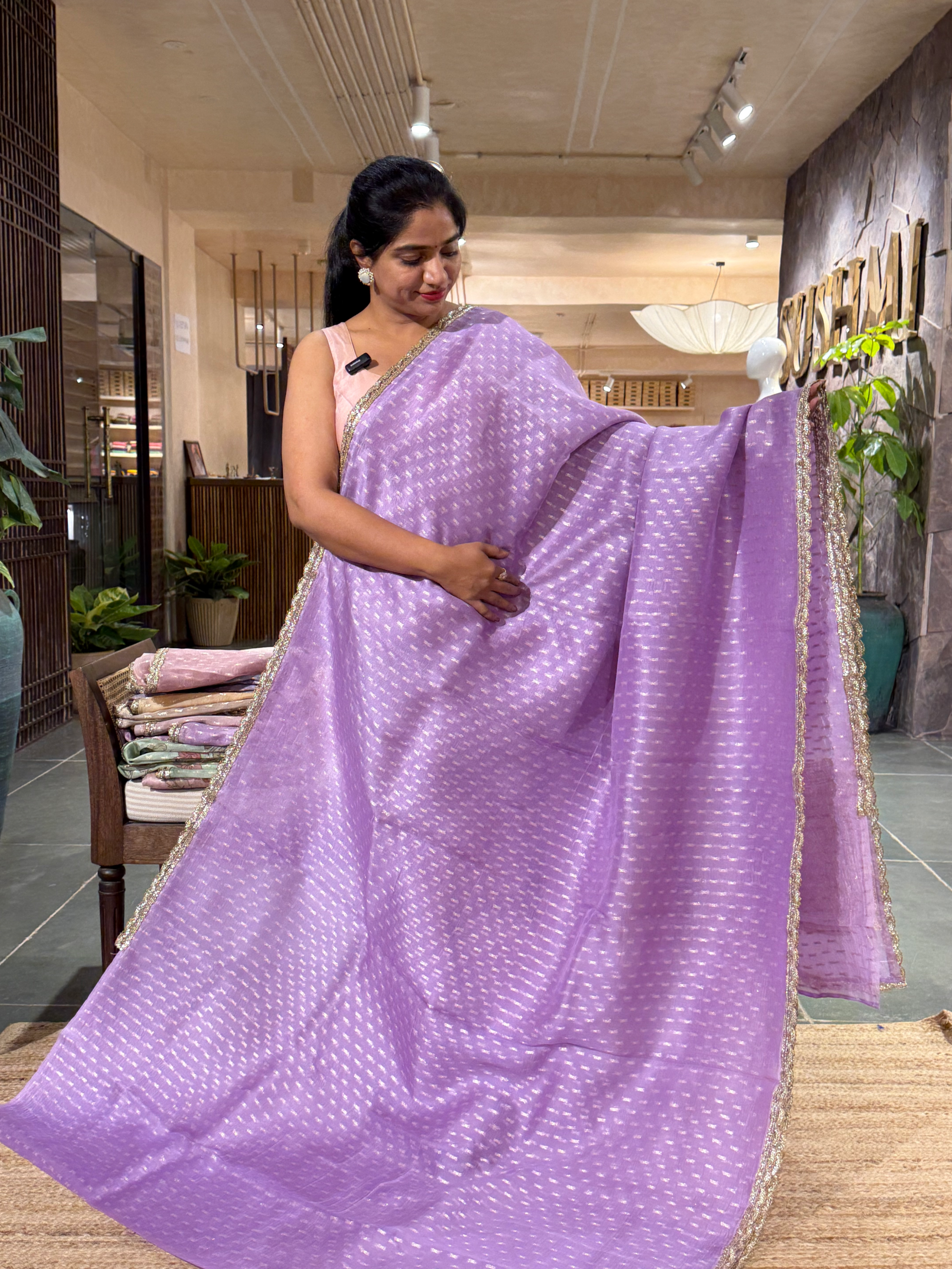 Lilac Pure Organza Saree with allover zari butis paired with Embroidered Blouse