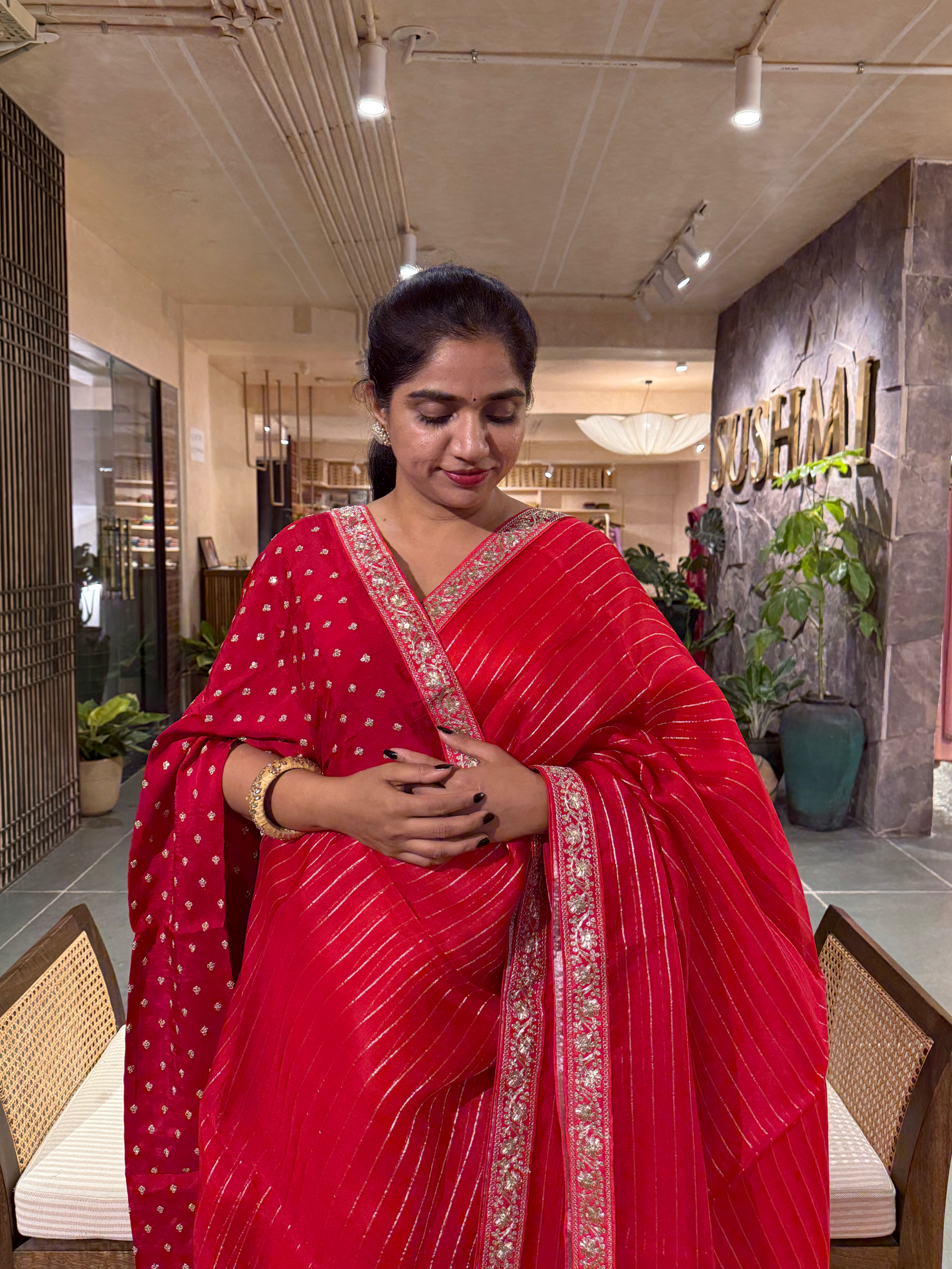 SOSSM2903 Red Organza Saree hemlined with Sabhyasachi Borders