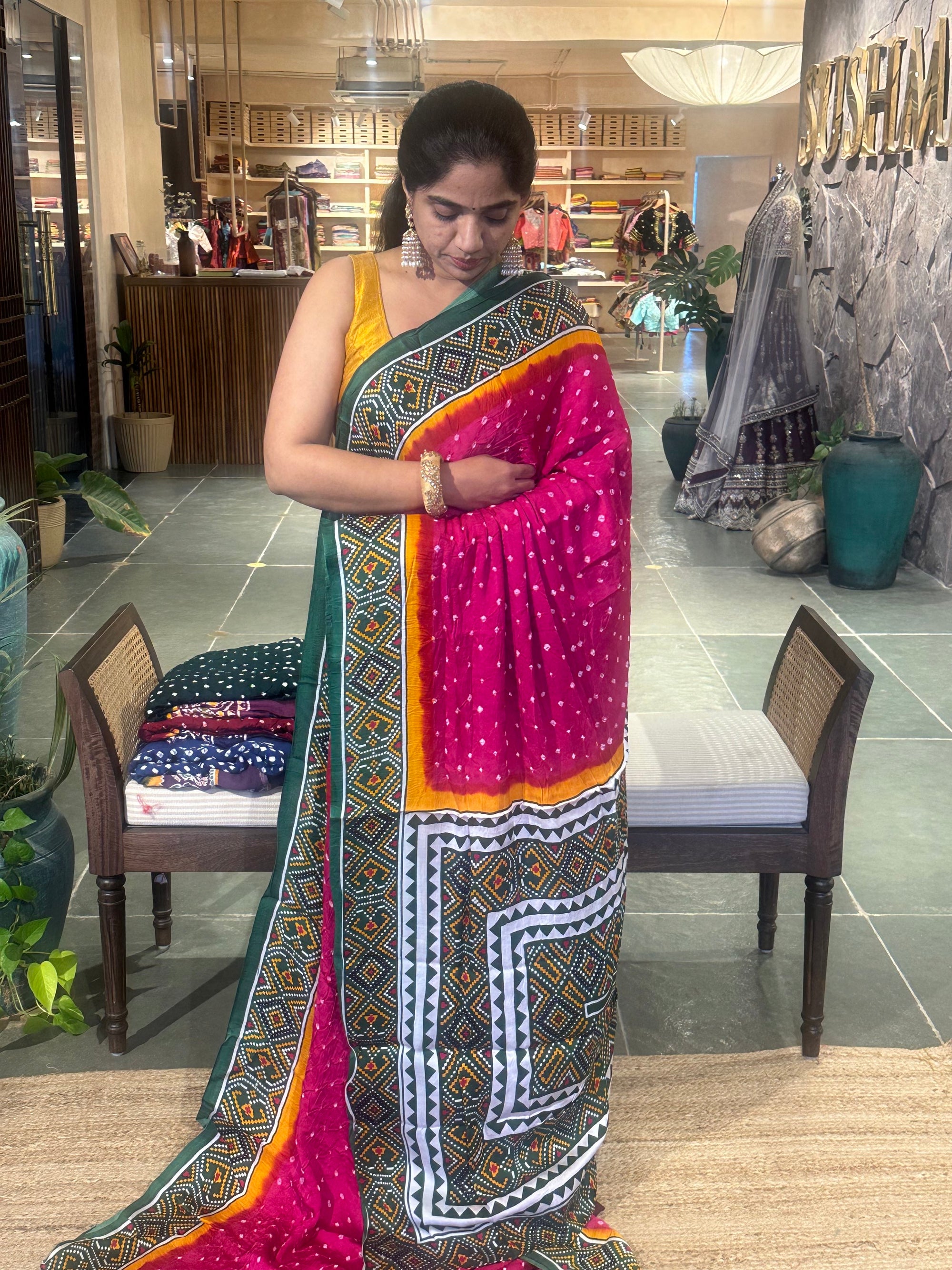 Modal satin Bandhej saree with patola printed border and pallu