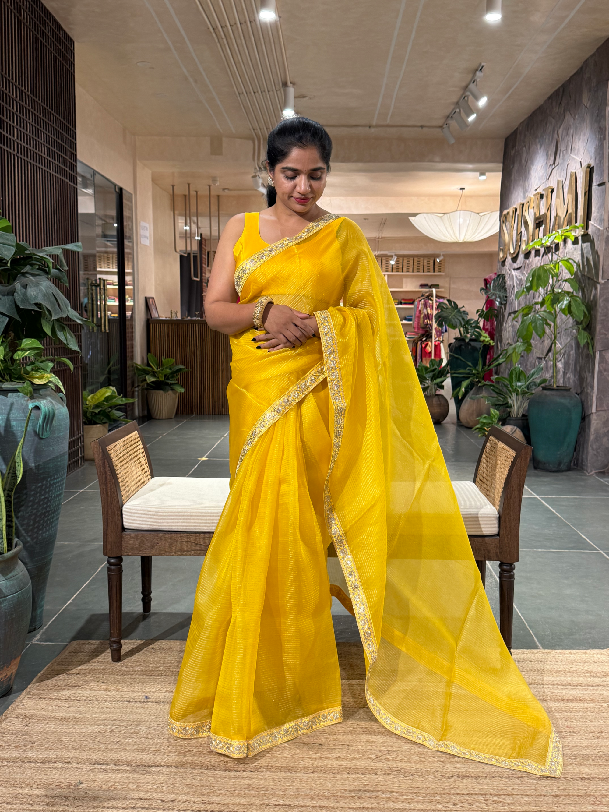 SOSSM2901 Yellow Organza Saree hemlined with Sabhyasachi Borders