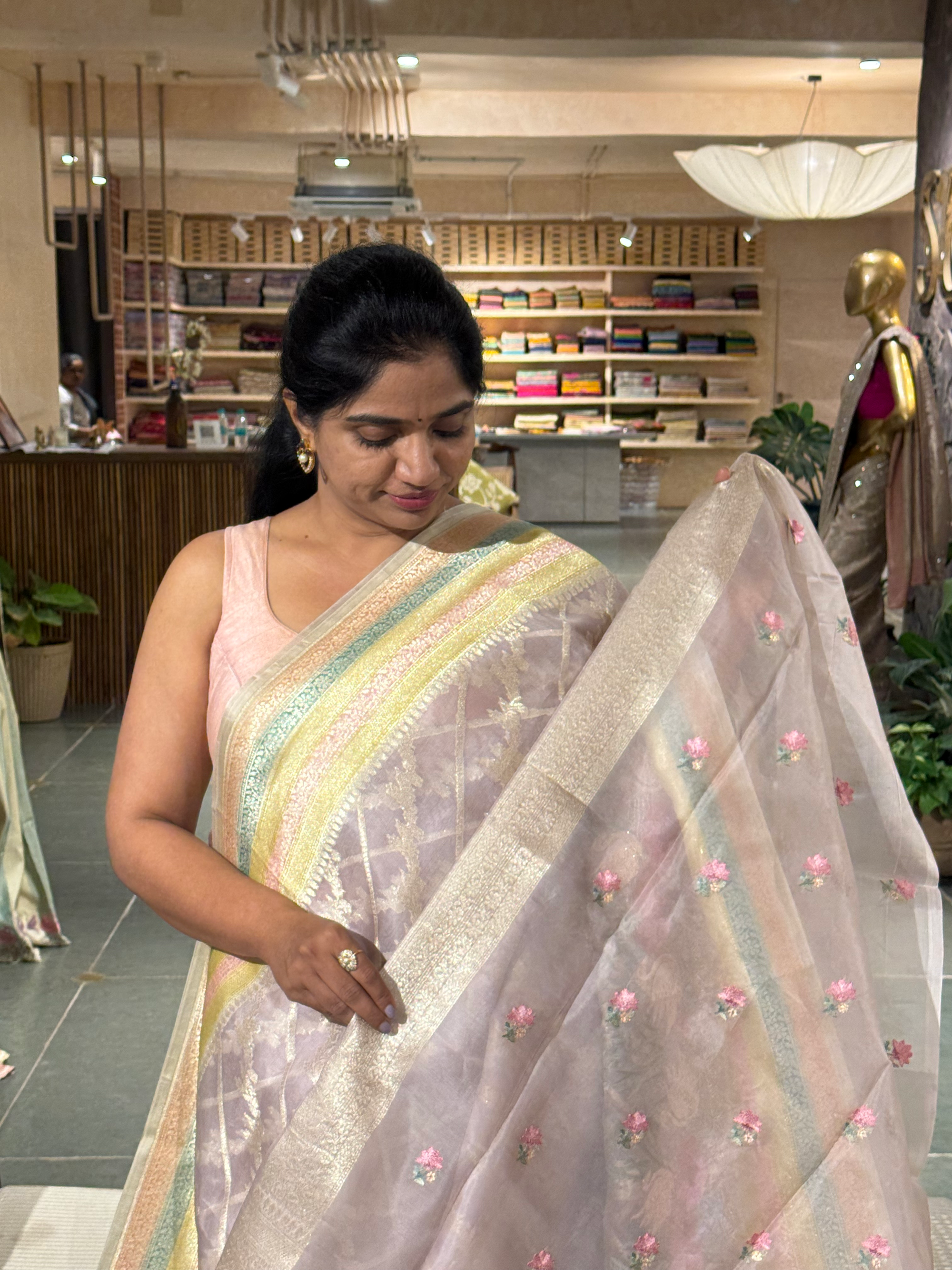 Pure Handloom Kora Banarasi with rangkaat and embroidered borders and blouse.