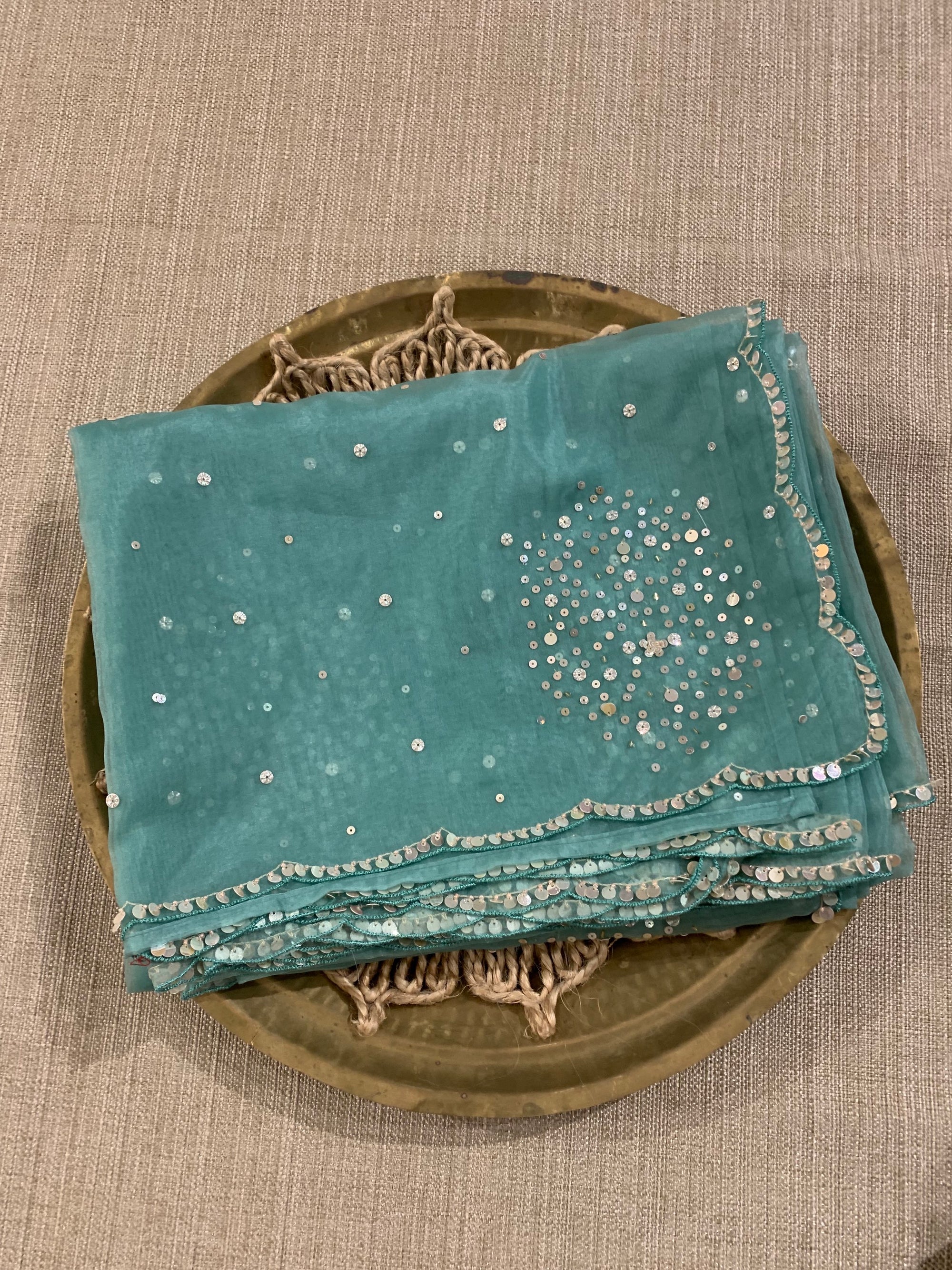 Sea Green Organza Saree with allover work and paired with heavy blouse
