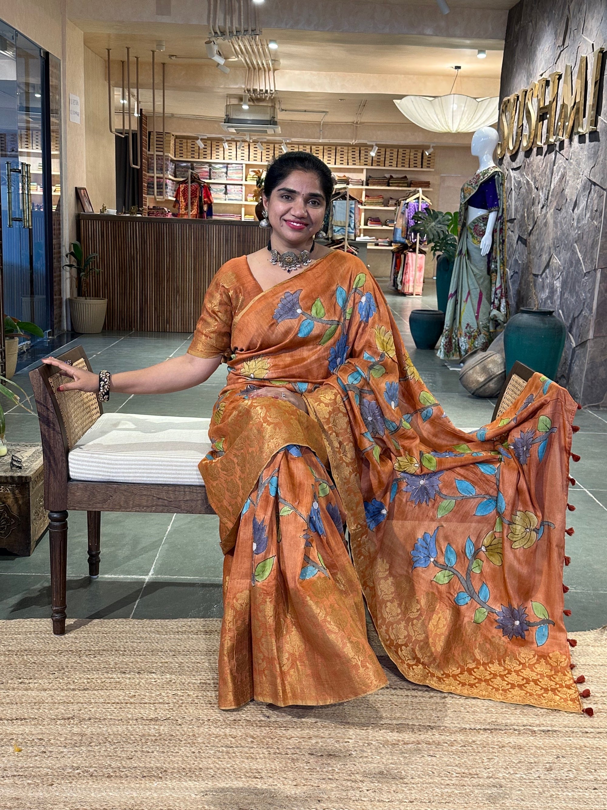 Rust Orange Pure Handloom Munga Banarasi Saree with pichwai handpainting .