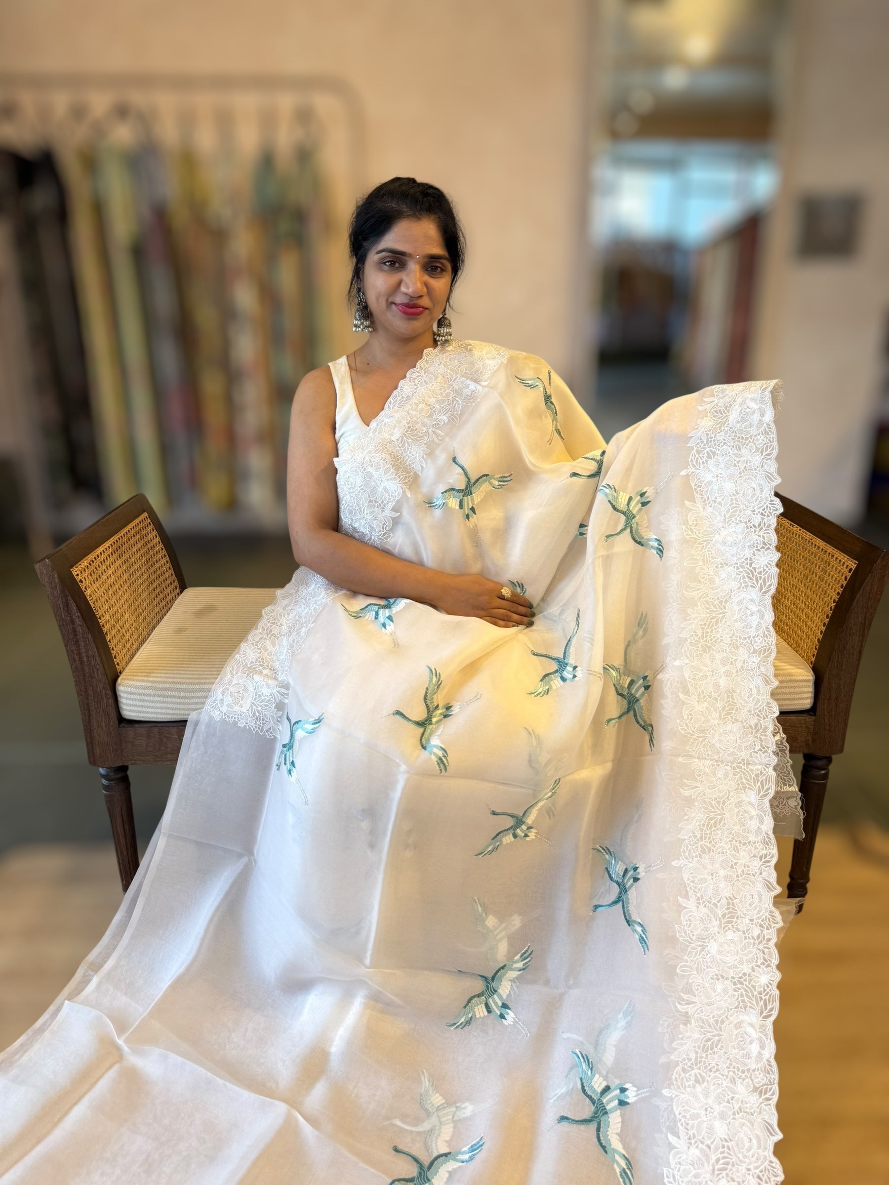 Ivory Organza Saree with Cutwork Borders & Blue Cranes