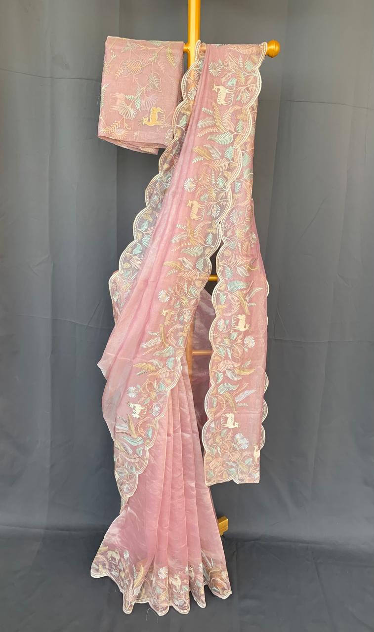 Baby Pink Tissue Designer Saree with by heavy embroidered Borders  .