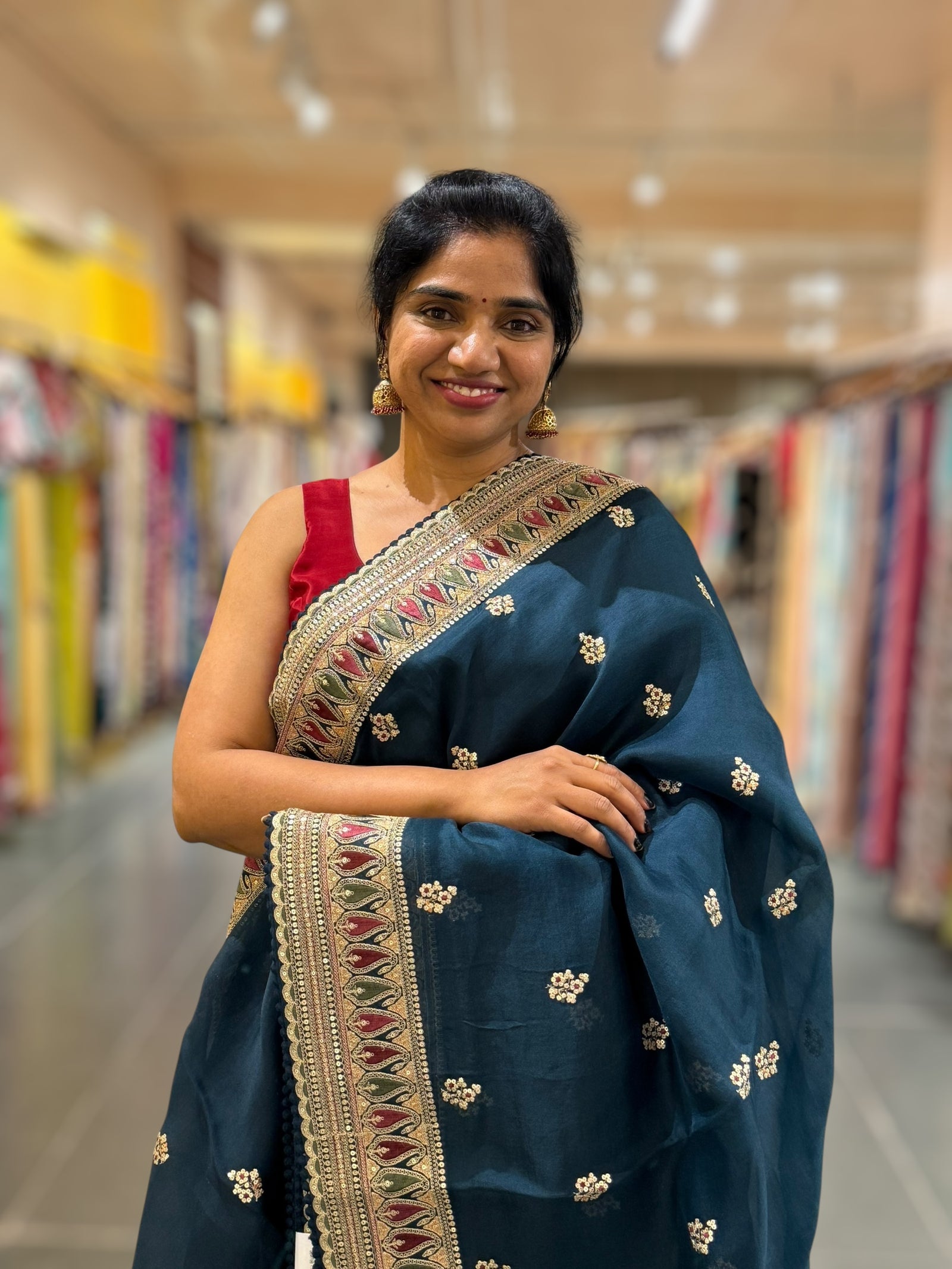 Luxe Peacock Blue Organza Saree with Sabyasachi-Inspired Border & Blouse