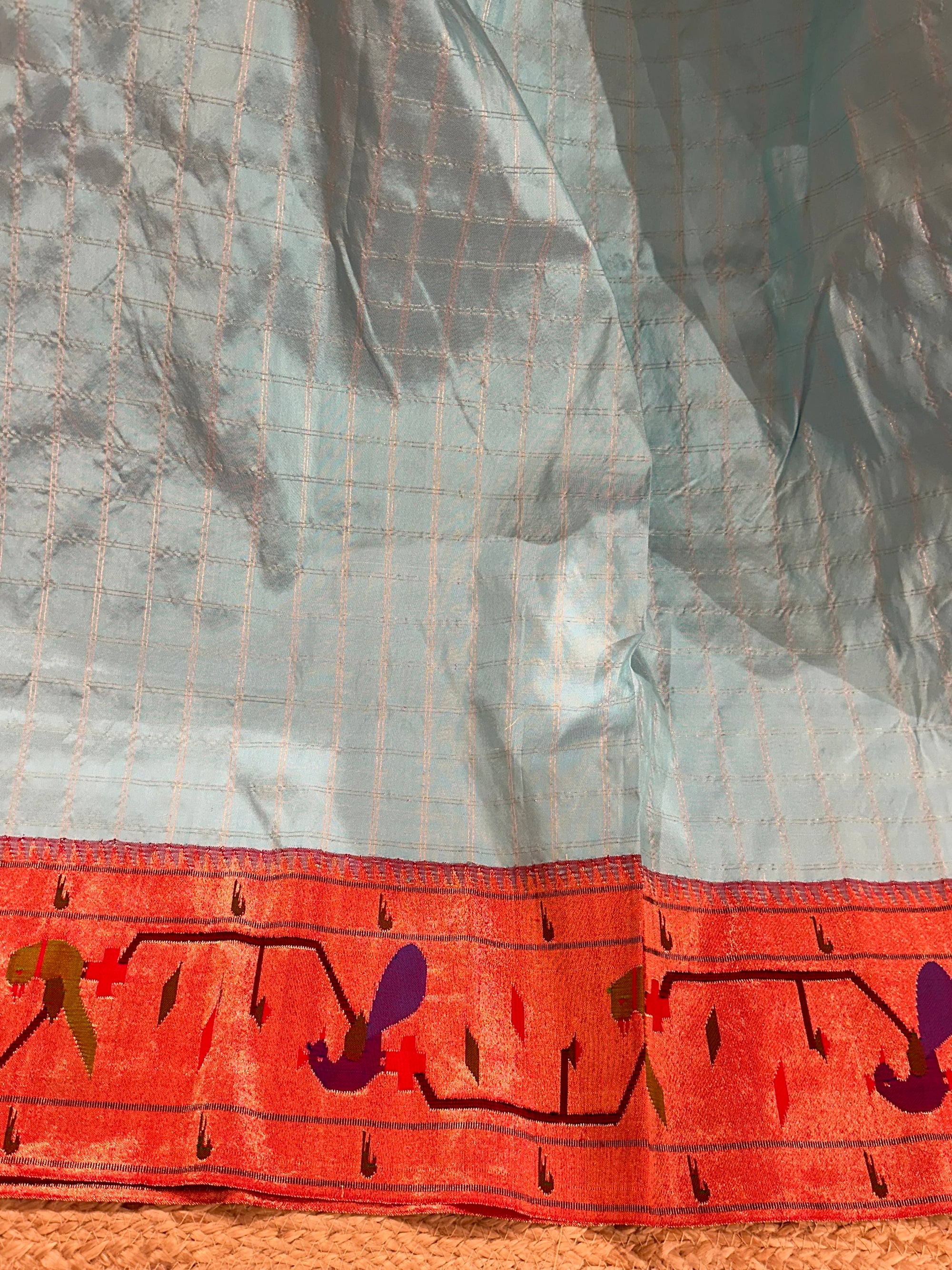 Sky blue checks Pure Pythani saree with parrot peacock border