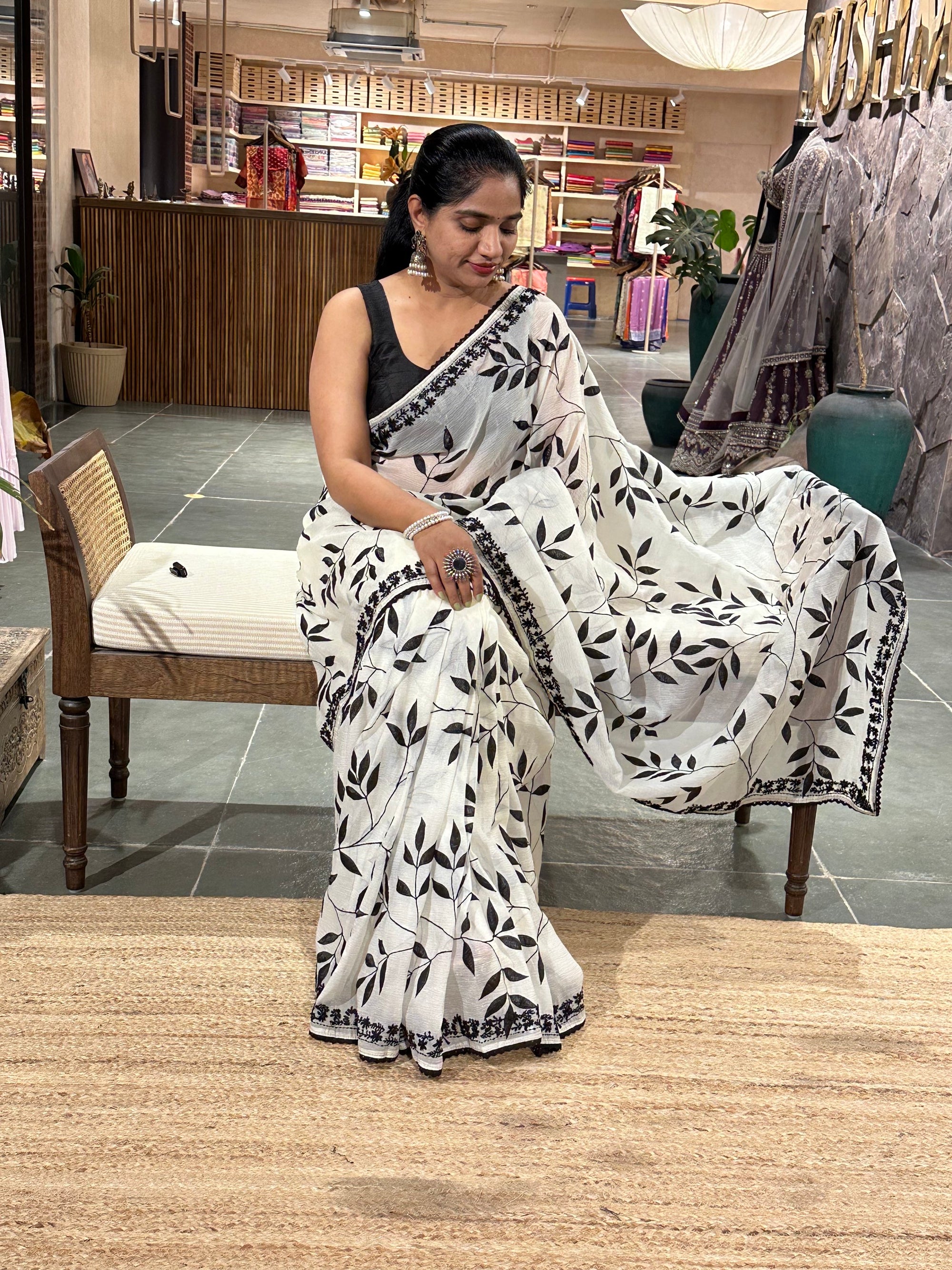 Half white crush Saree with allover applique work in leaf creeper pattern  and h