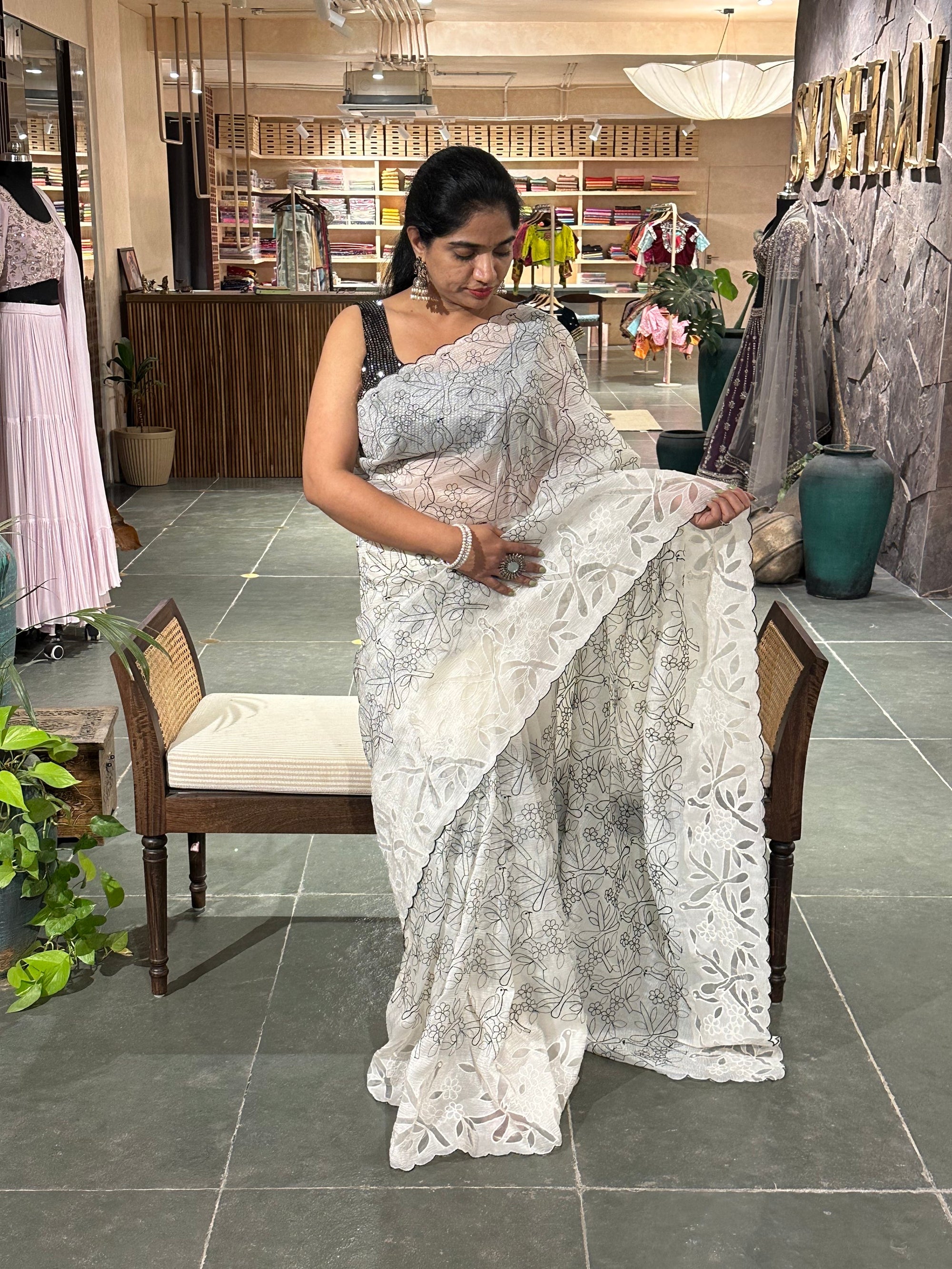 White crush organza saree with allover paithani inspired threadwork and cutwork