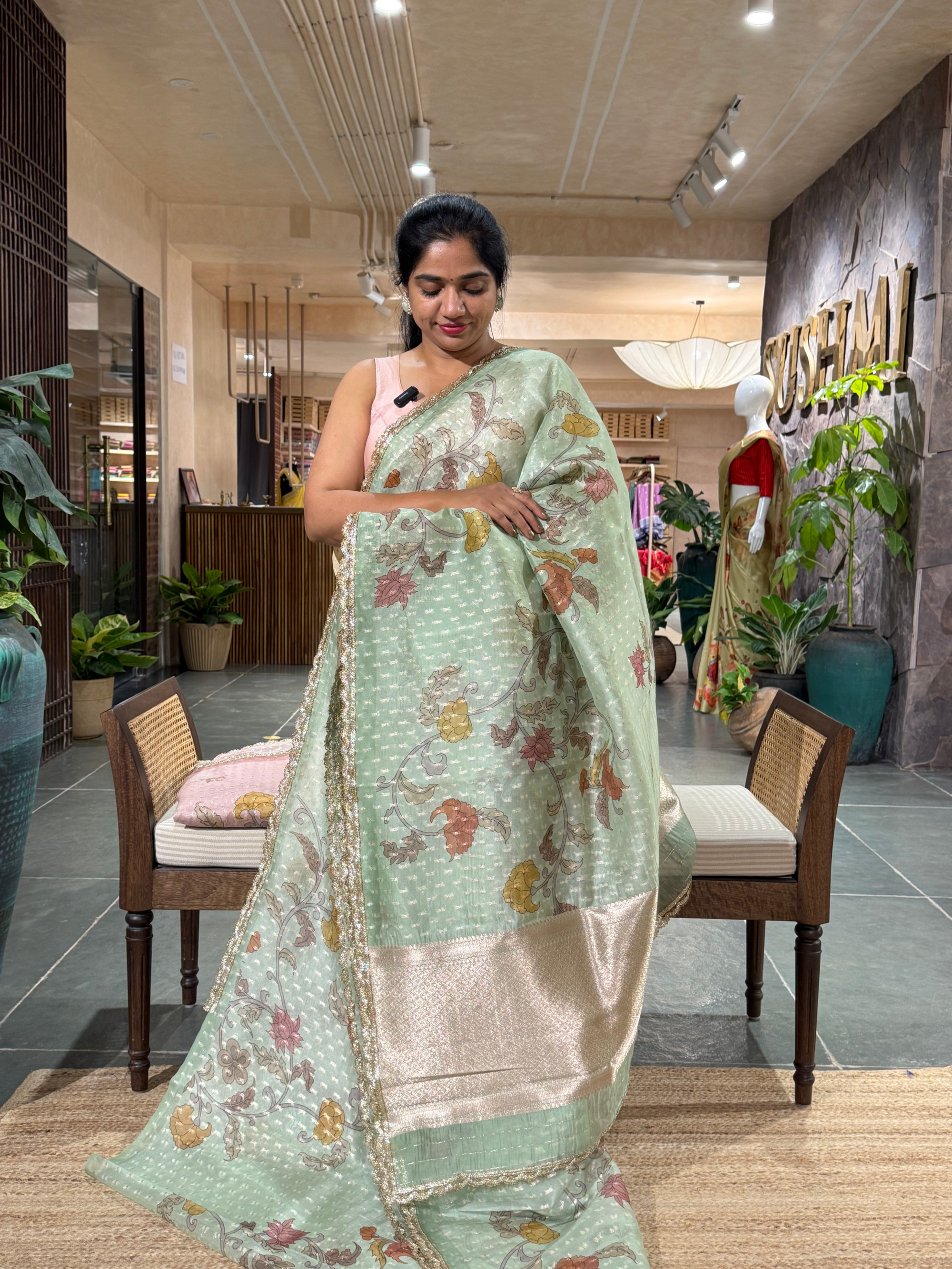 Mint Green Pure Organza Saree with allover zari butis and floral print paired wi