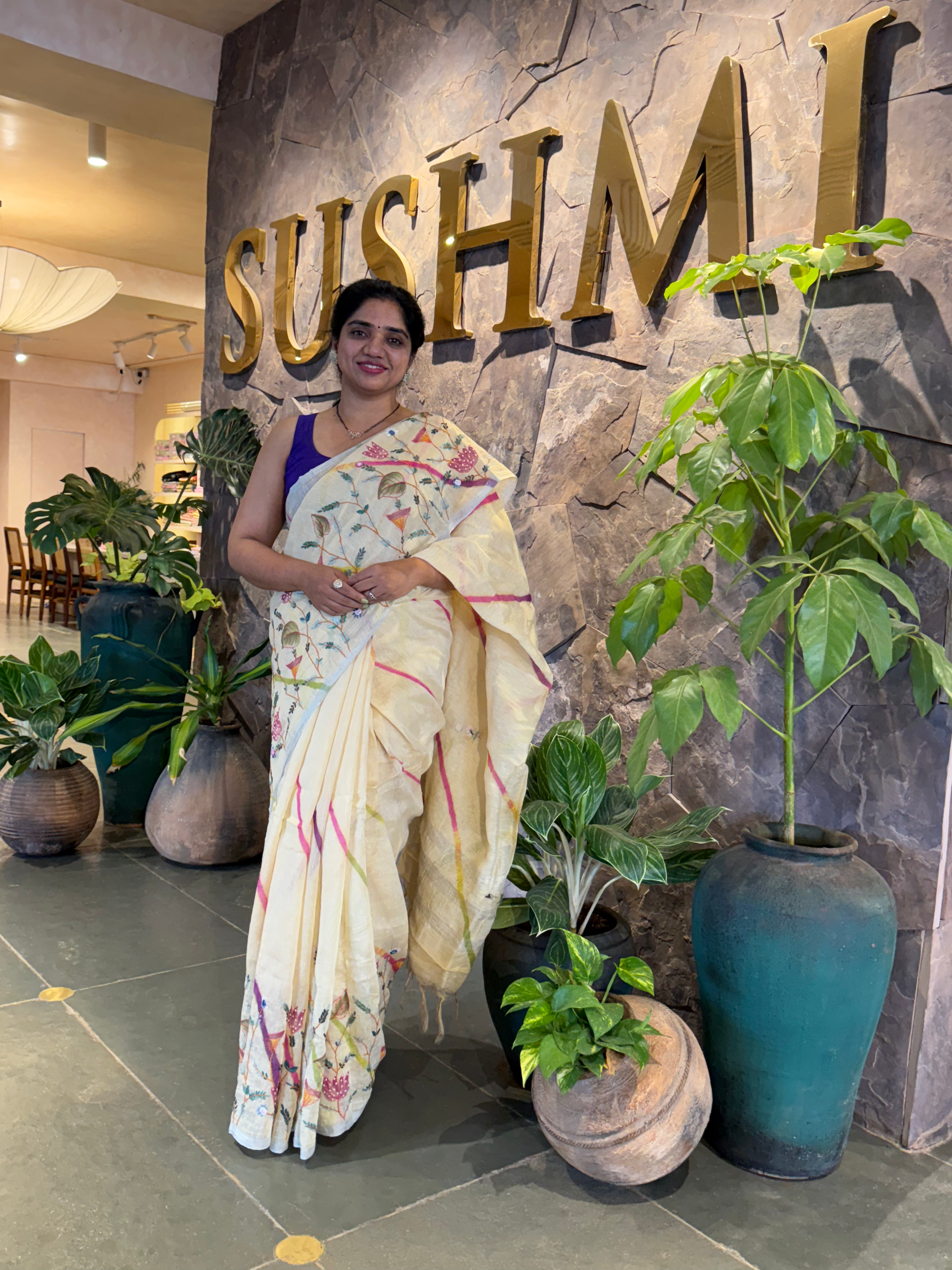 Lenin silk Saree with hanpainted border hightlighted with handwork