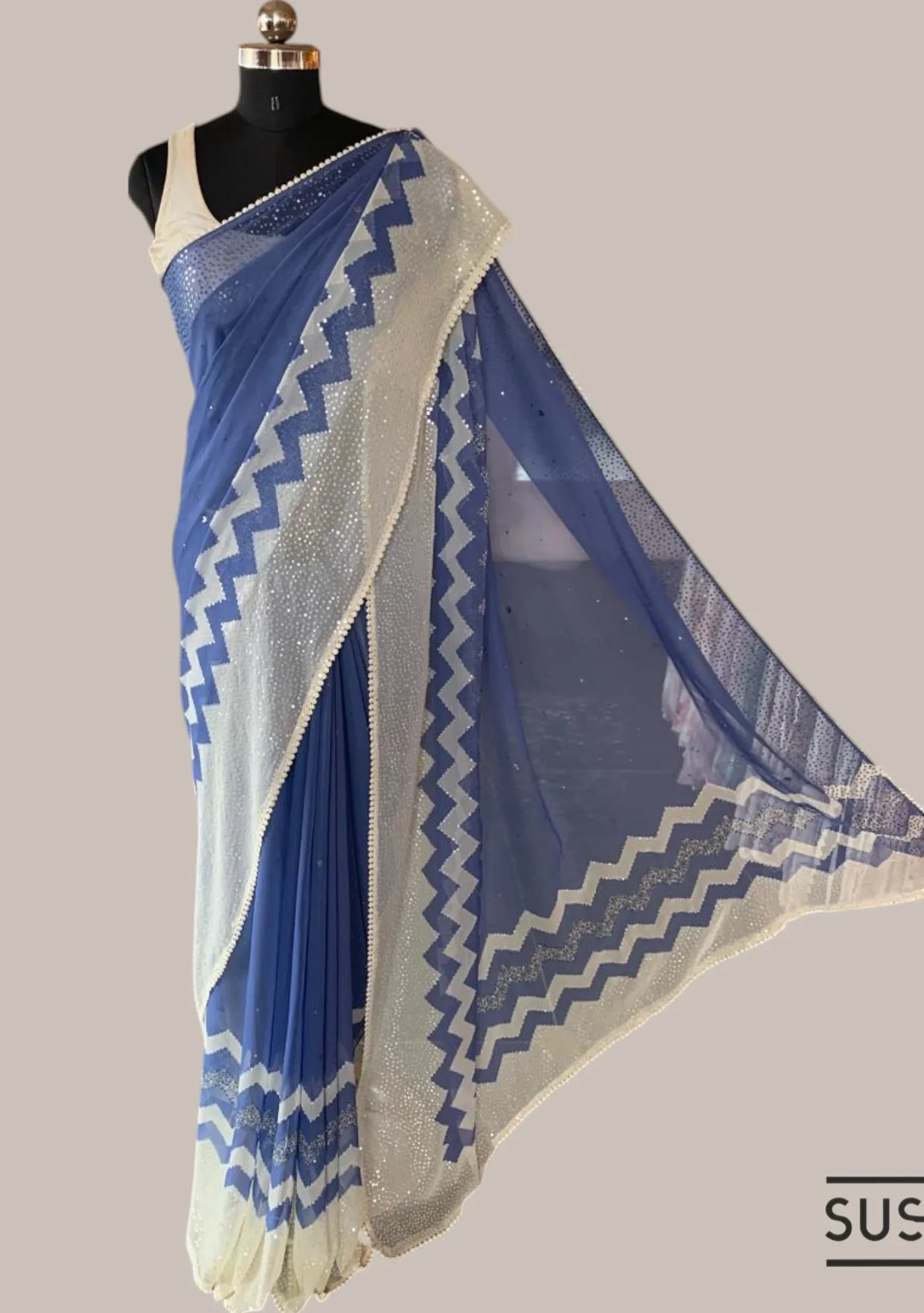 Blue Pure Gorgette Saree With Zigzag Pattern Sequnce Border