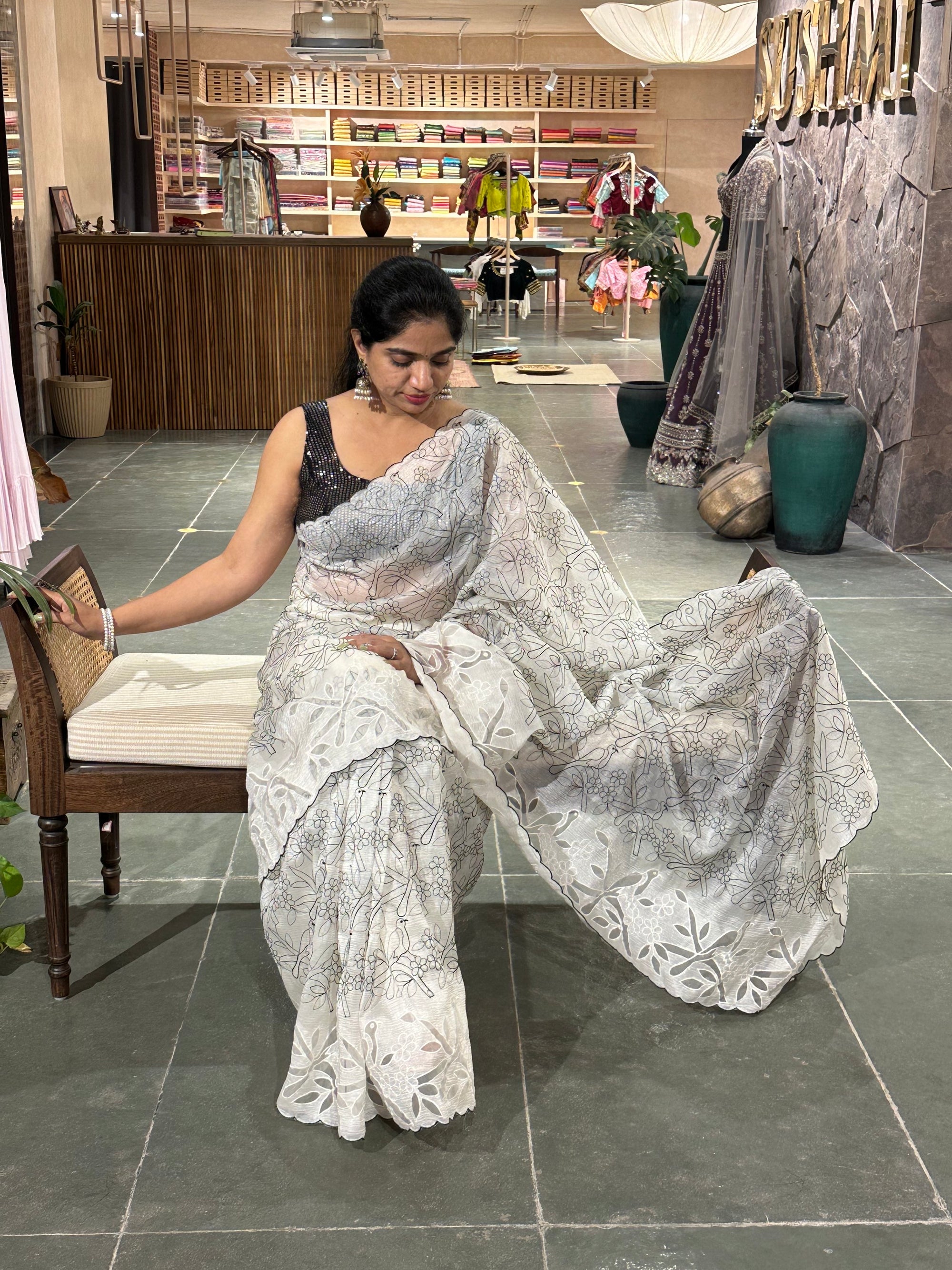 White crush organza saree with allover paithani inspired threadwork and cutwork
