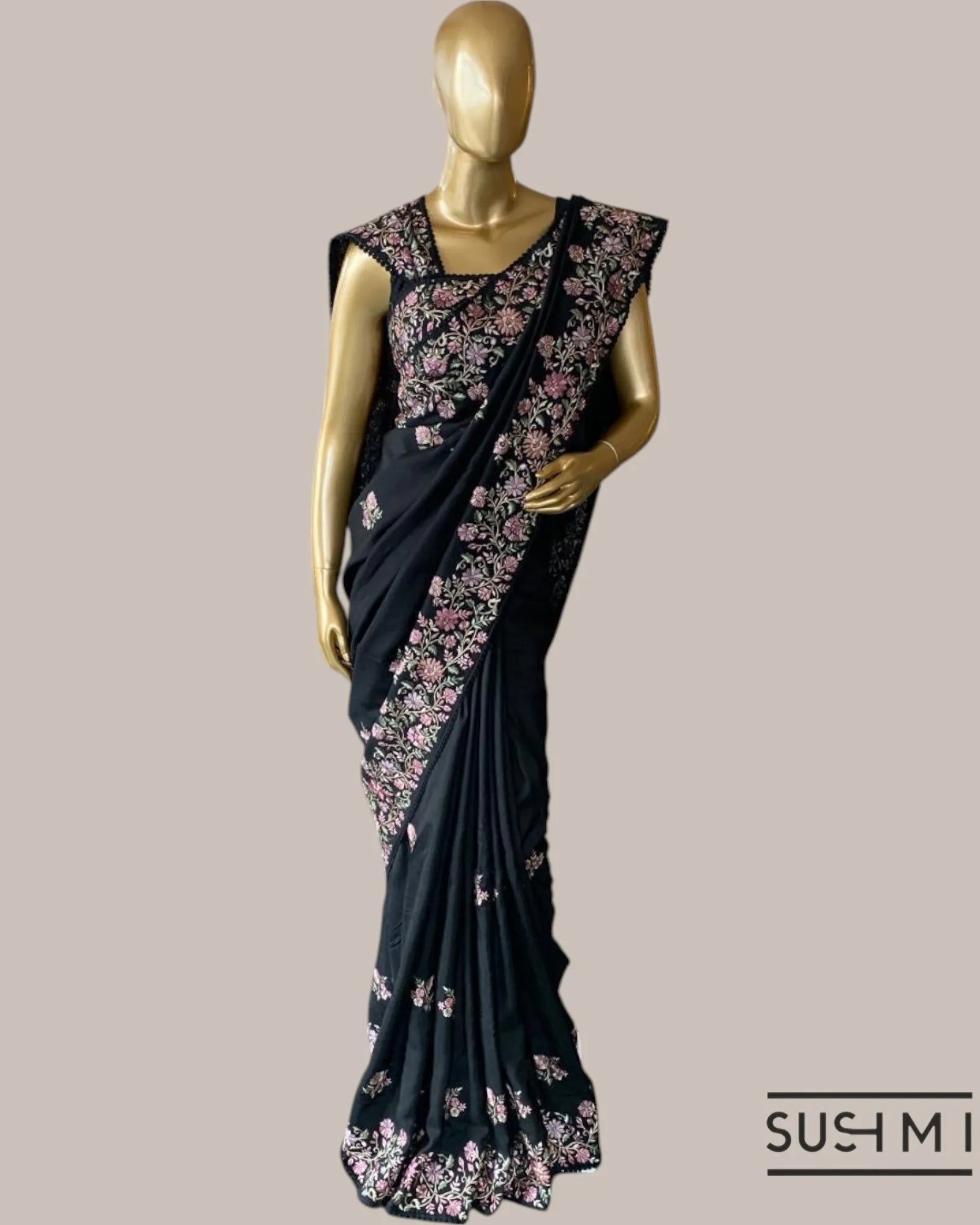Black Tussar Organza Saree with beautiful multi color embroidered border hemline