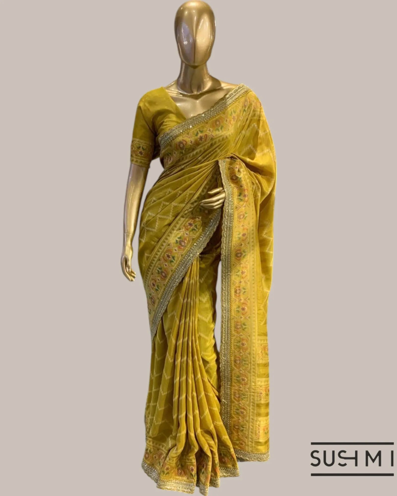 Mustard Tussar Silk Gorgette Saree in Ikkath Patola style Chevron body and Patol