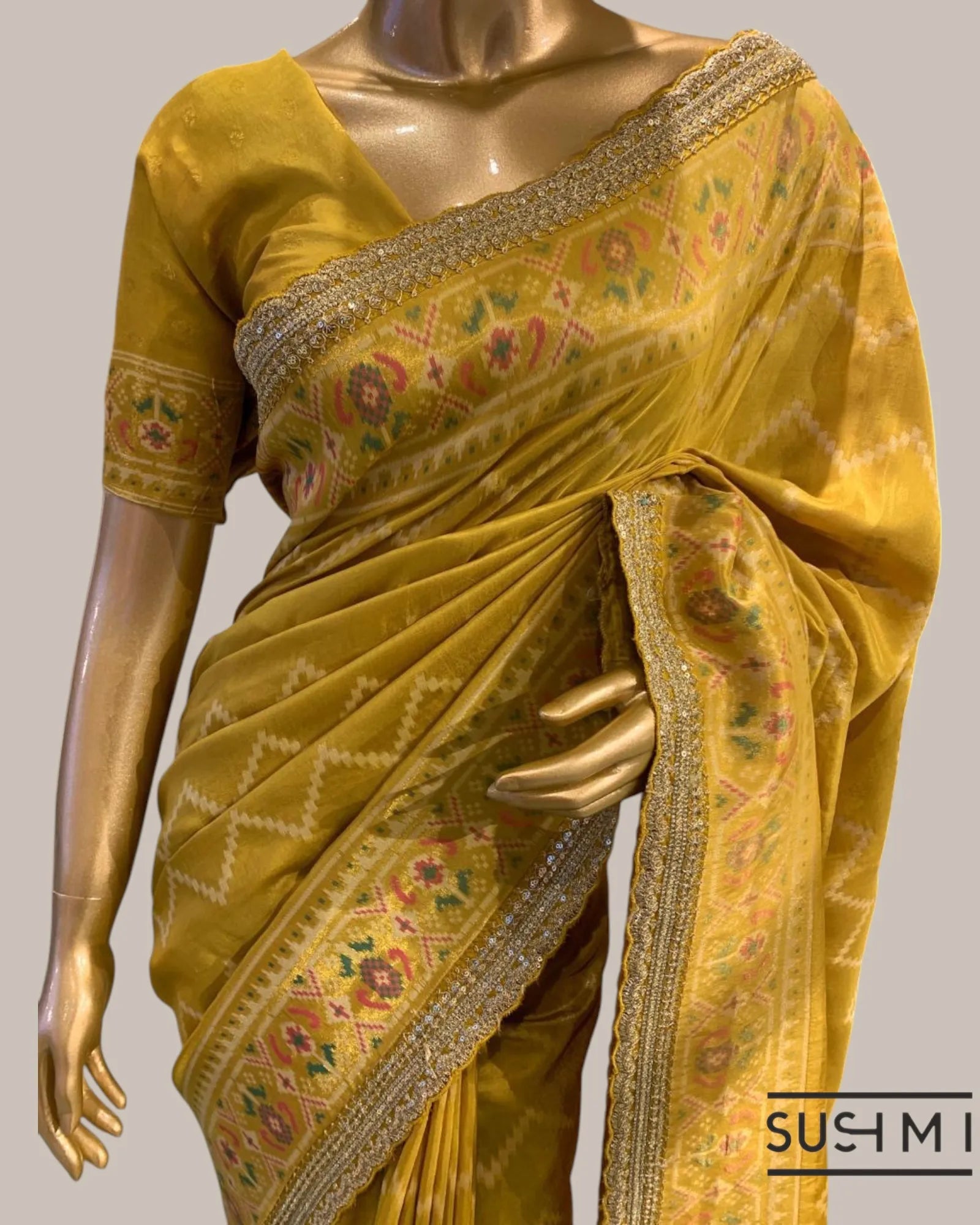 Mustard Tussar Silk Gorgette Saree in Ikkath Patola style Chevron body and Patol