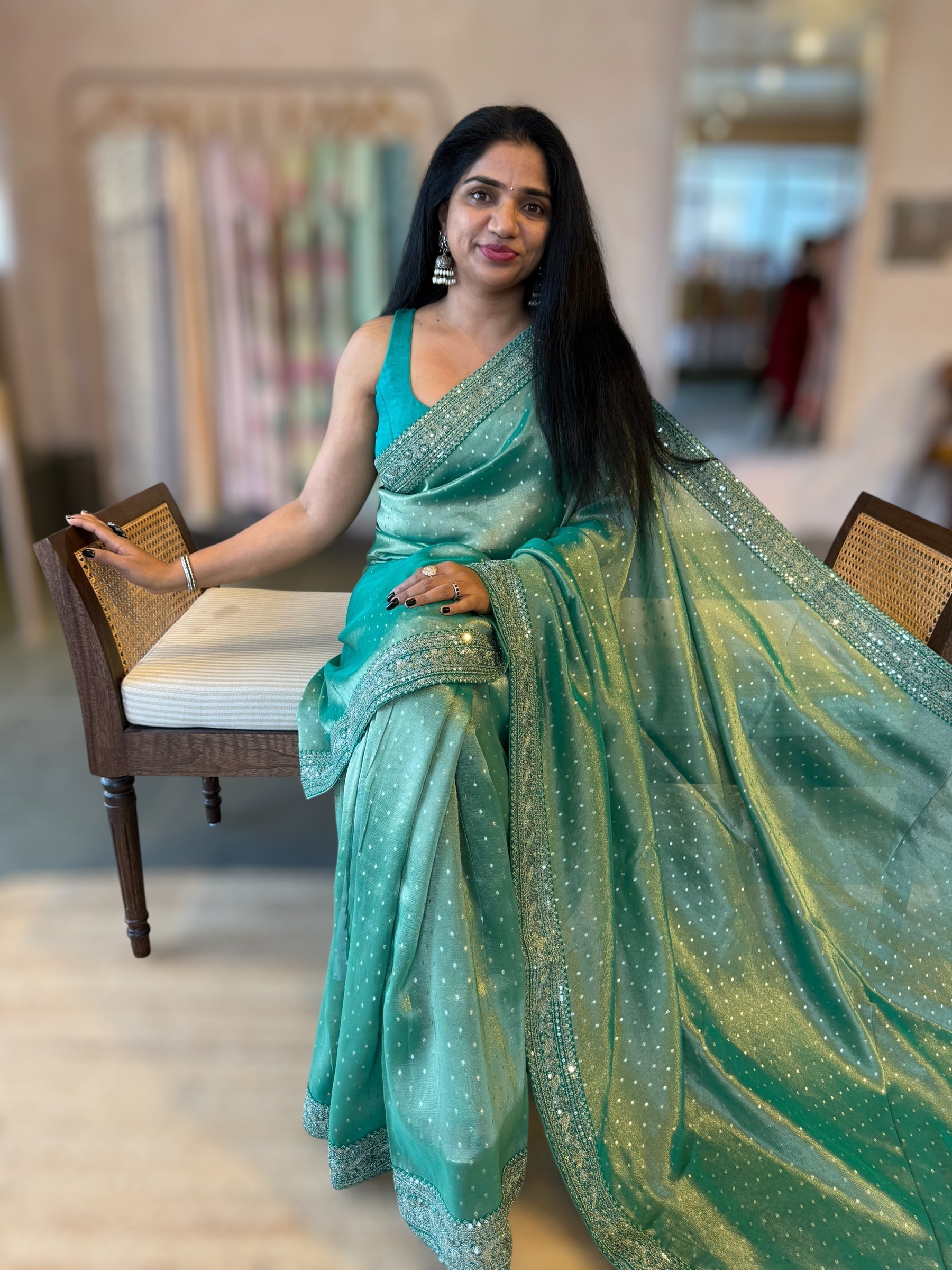 Teal Tissue Gorgette saree with sabyasachi borders and allover pitawork blouse