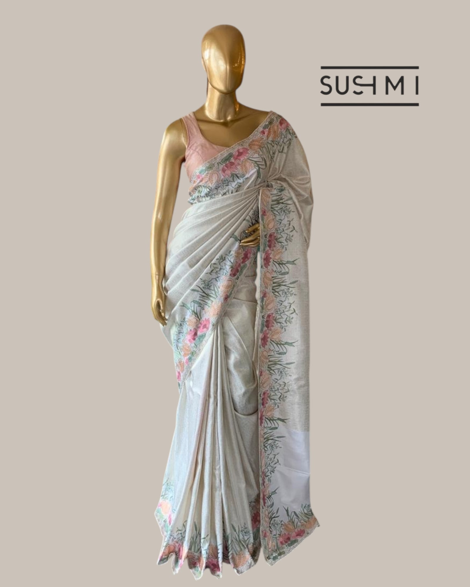 White Kanjeevaram Brocade Saree With Beautiful Pond Theme Embroidered Border.