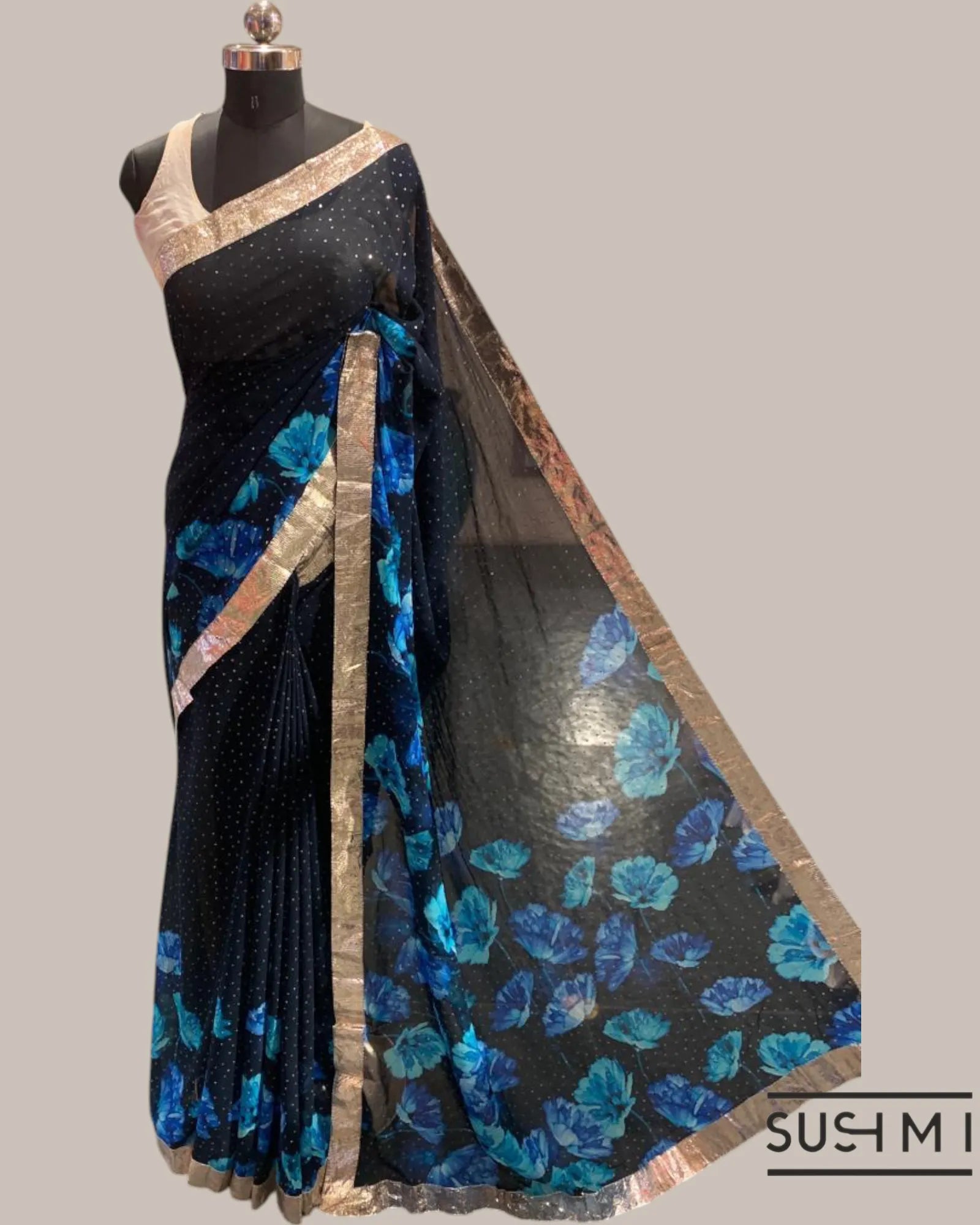 Pure Gorgette Saree with floral printed border and pallu hemlined with gota lace