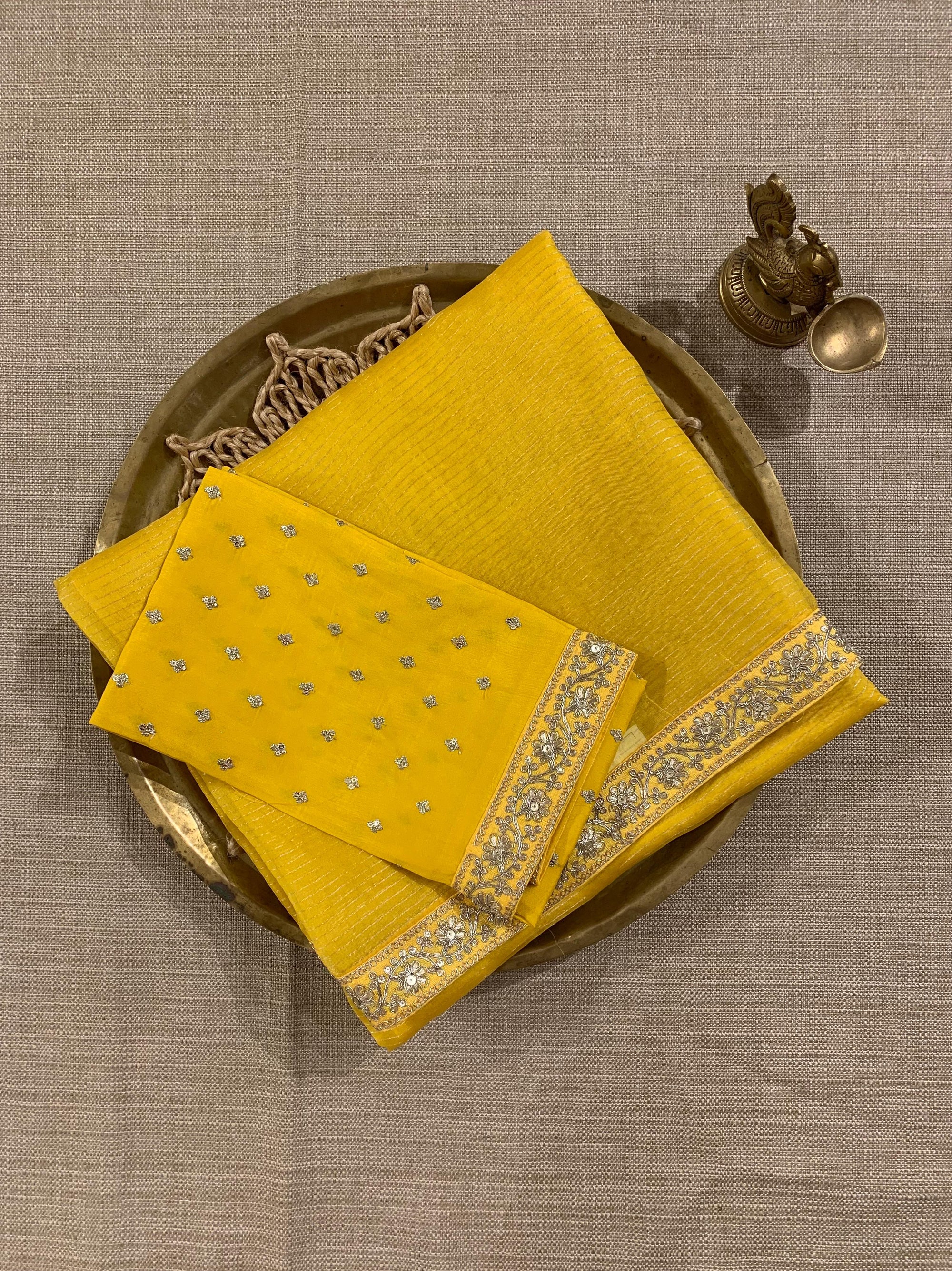 SOSSM2901 Yellow Organza Saree hemlined with Sabhyasachi Borders