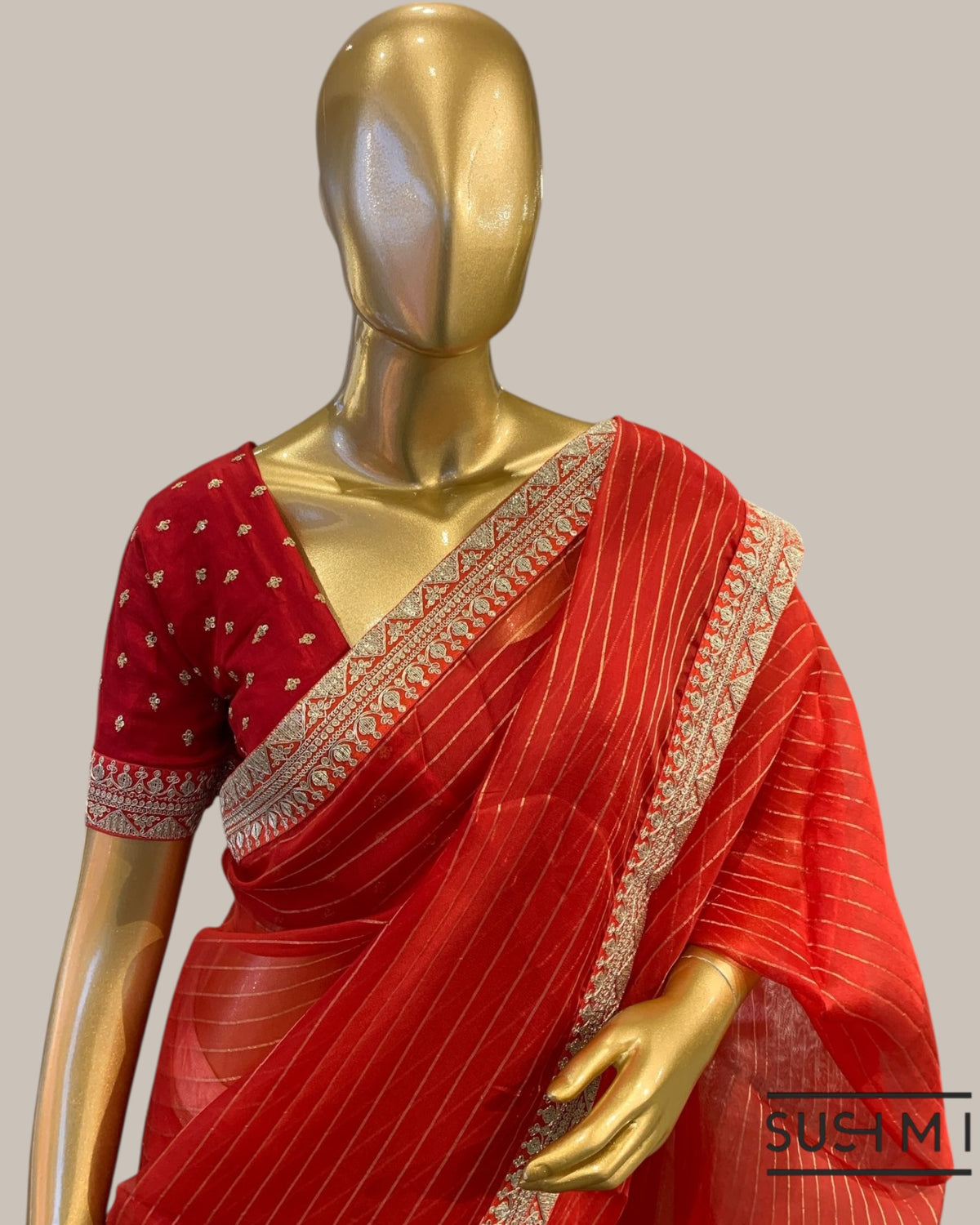Red Organza Saree with Zari stripes Hemlined with sabhyasachi border and blouse