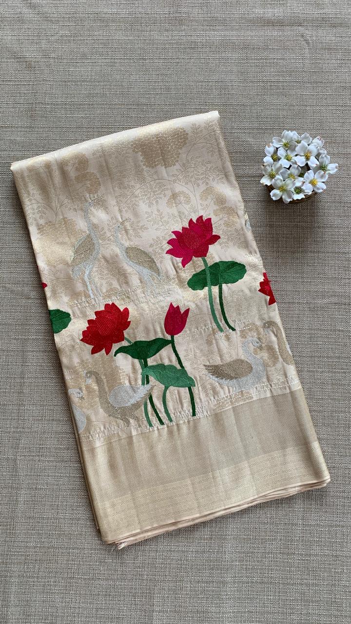 Ivory Kanjeevaram Brocade Silk Saree With Floral Embroidery Skirt Border