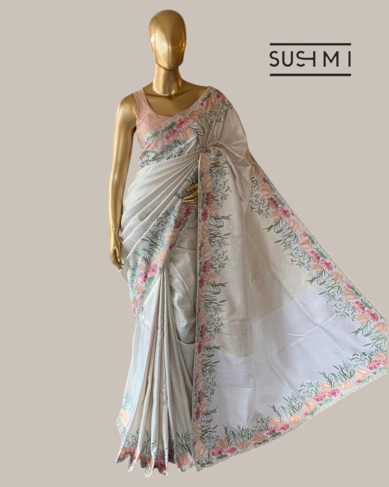 White Kanjeevaram Brocade Saree With Beautiful Pond Theme Embroidered Border.