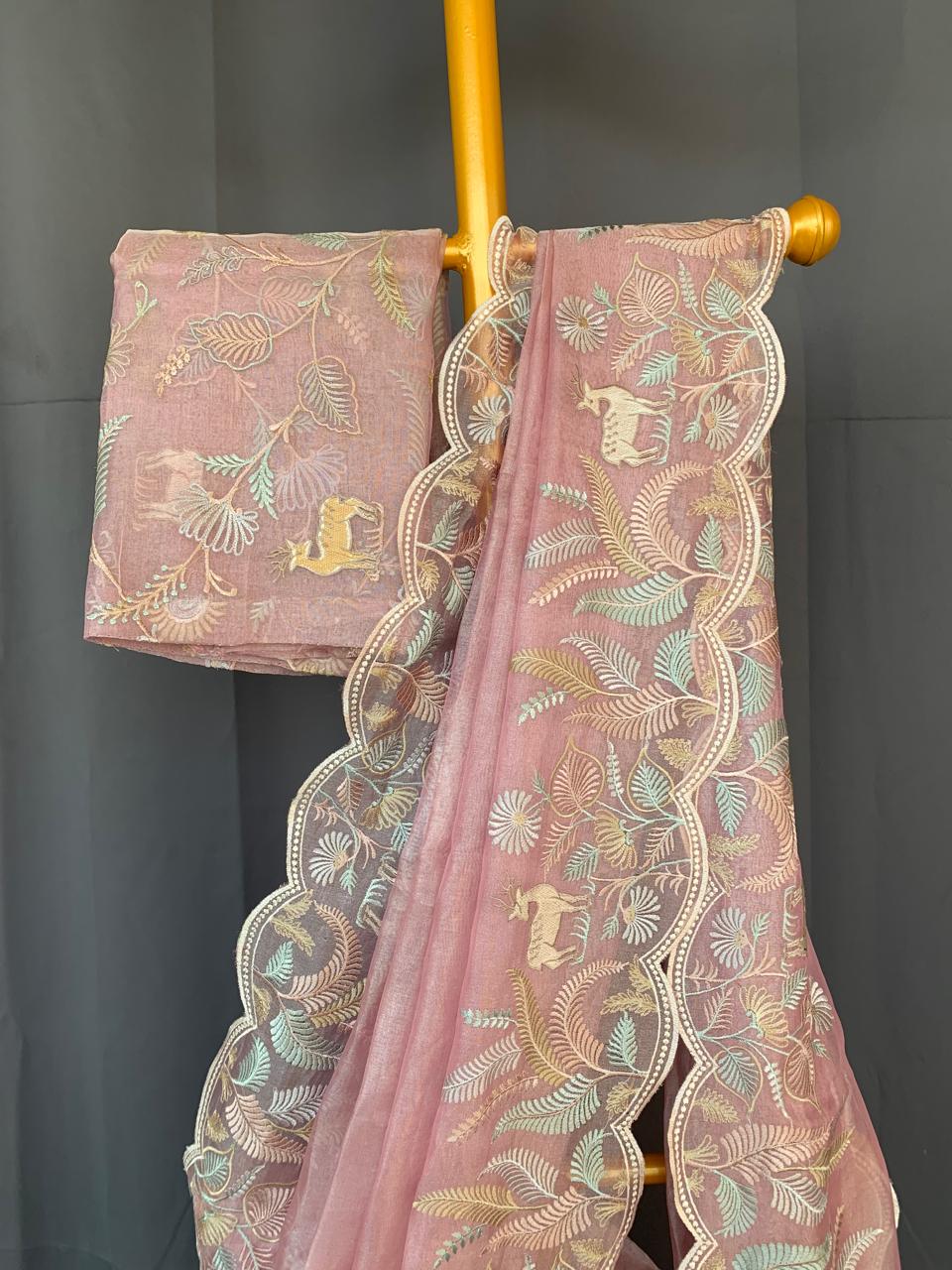 Baby Pink Tissue Designer Saree with by heavy embroidered Borders  .