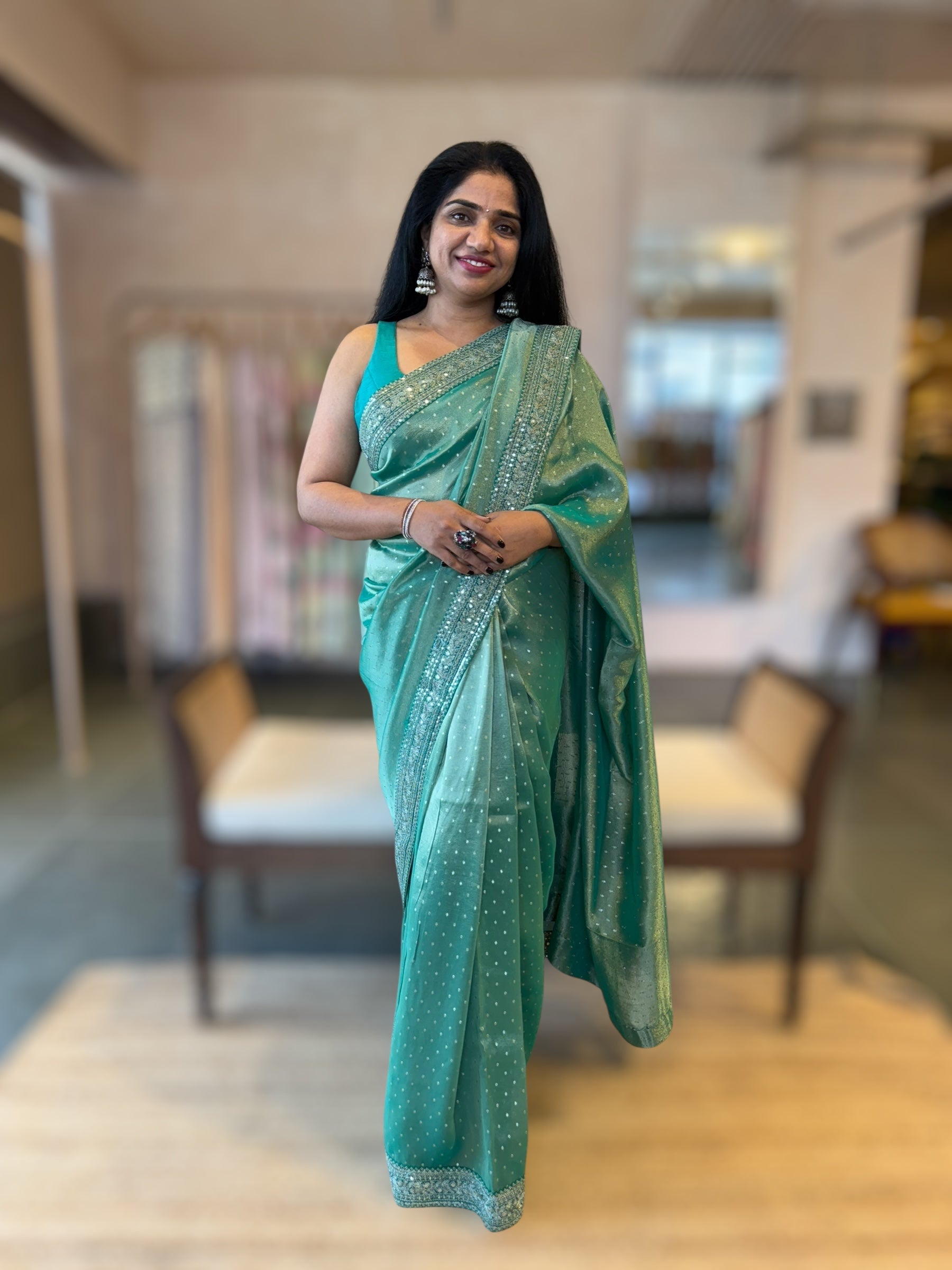Teal Tissue Gorgette saree with sabyasachi borders and allover pitawork blouse