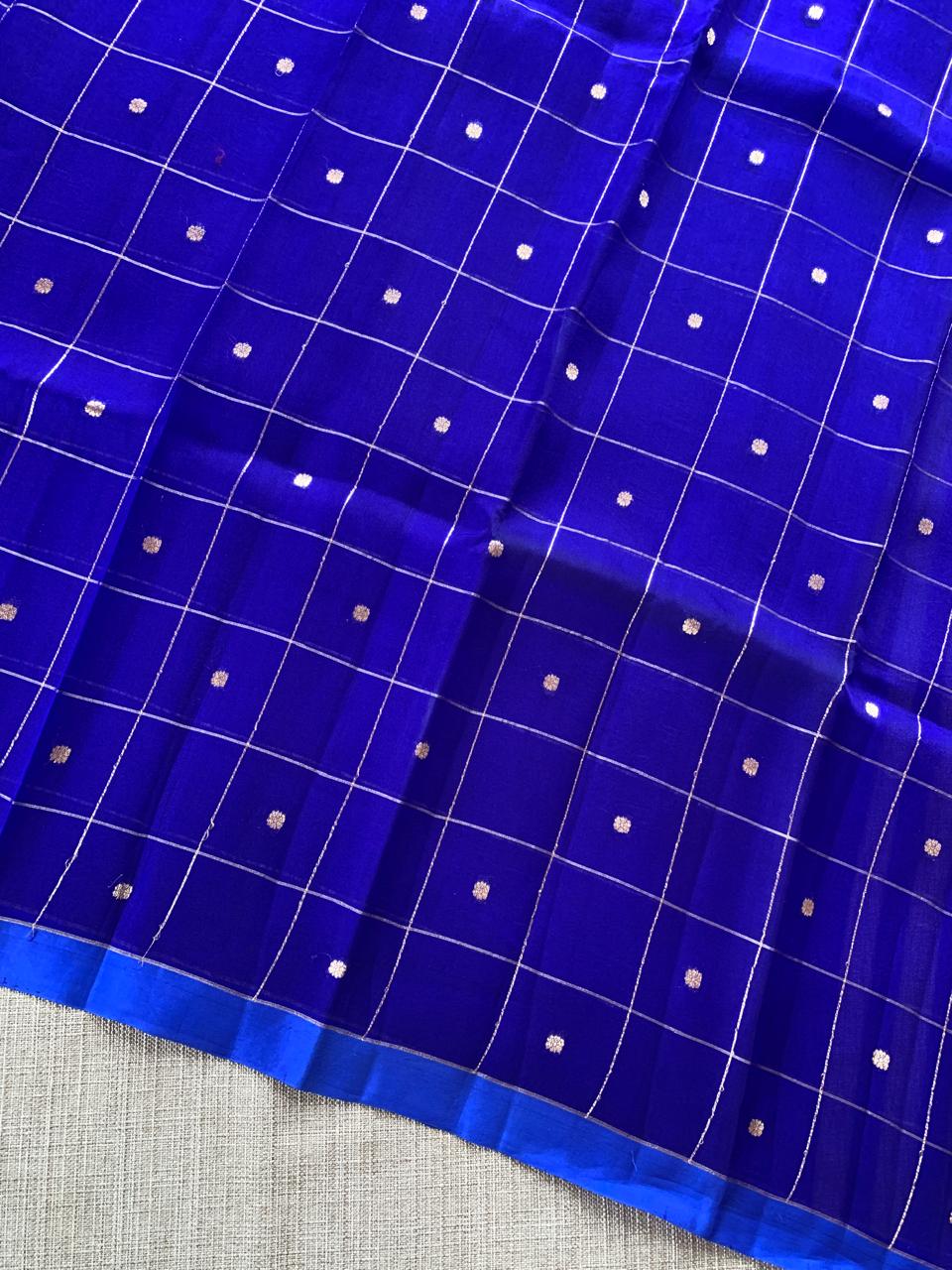 RoyalBlue Handloom Banarasi Kora Checks Saree with Kaduwa Woven Zari Motifs .