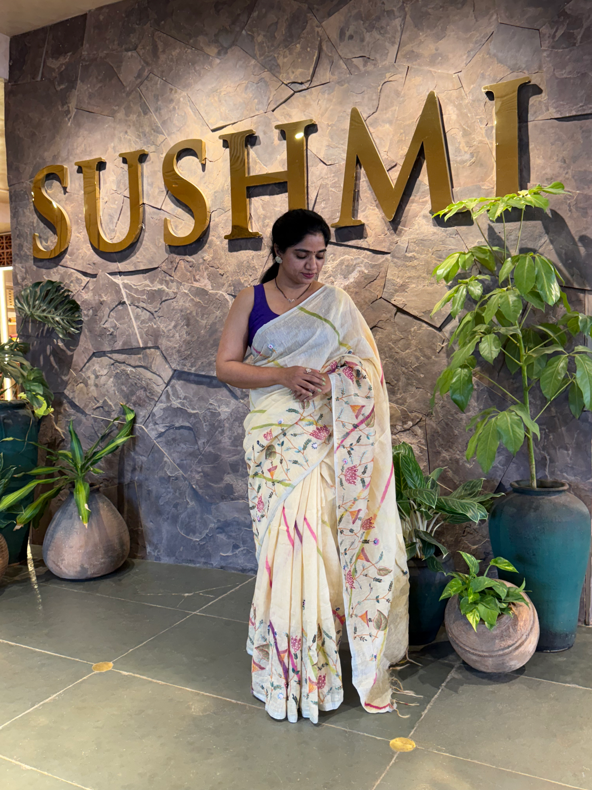 Lenin silk Saree with hanpainted border hightlighted with handwork