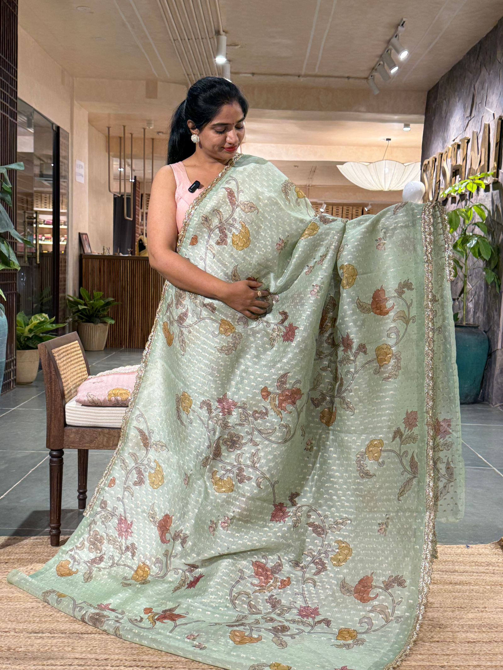 Mint Green Pure Organza Saree with allover zari butis and floral print paired wi