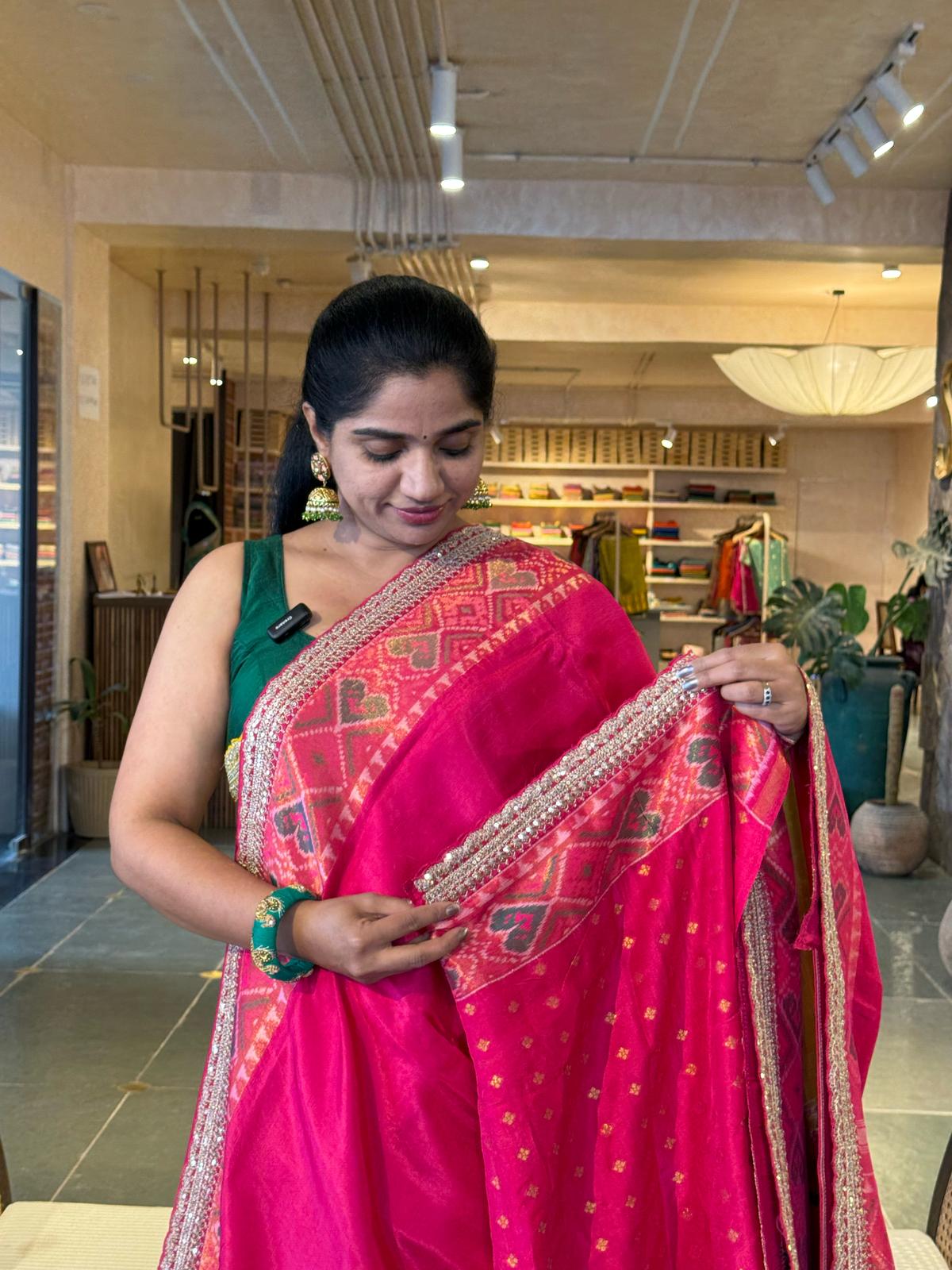 Rani pink falling Tussar silk saree with Patola borders and Sabhyasachi-style