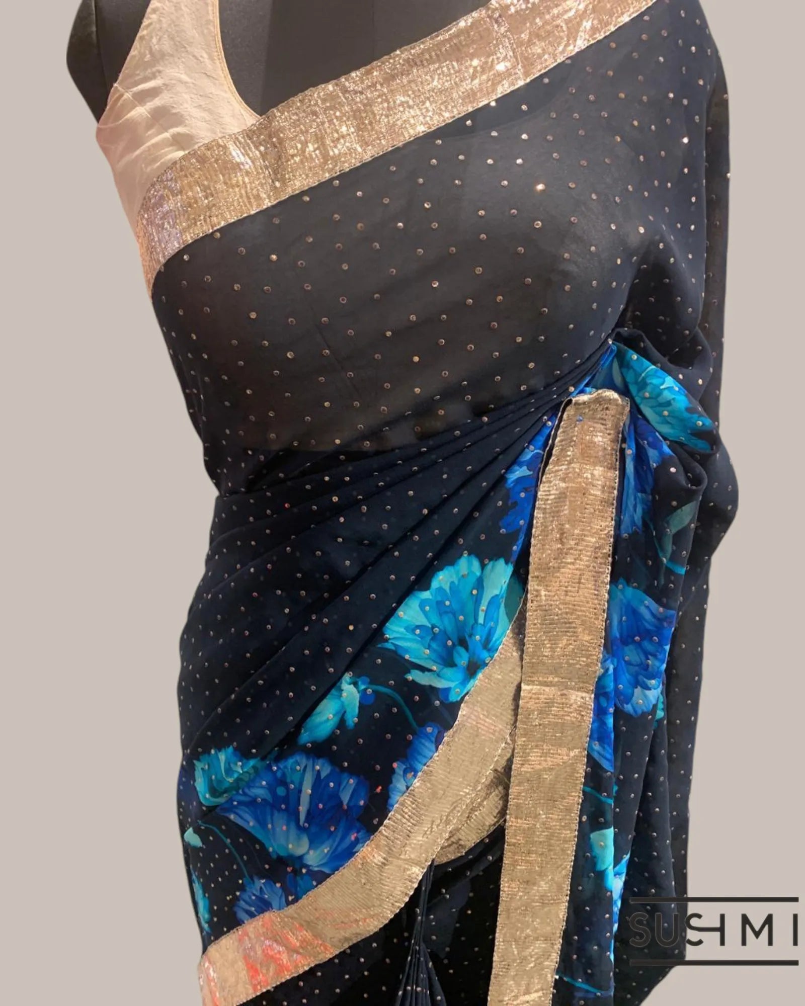 Pure Gorgette Saree with floral printed border and pallu hemlined with gota lace