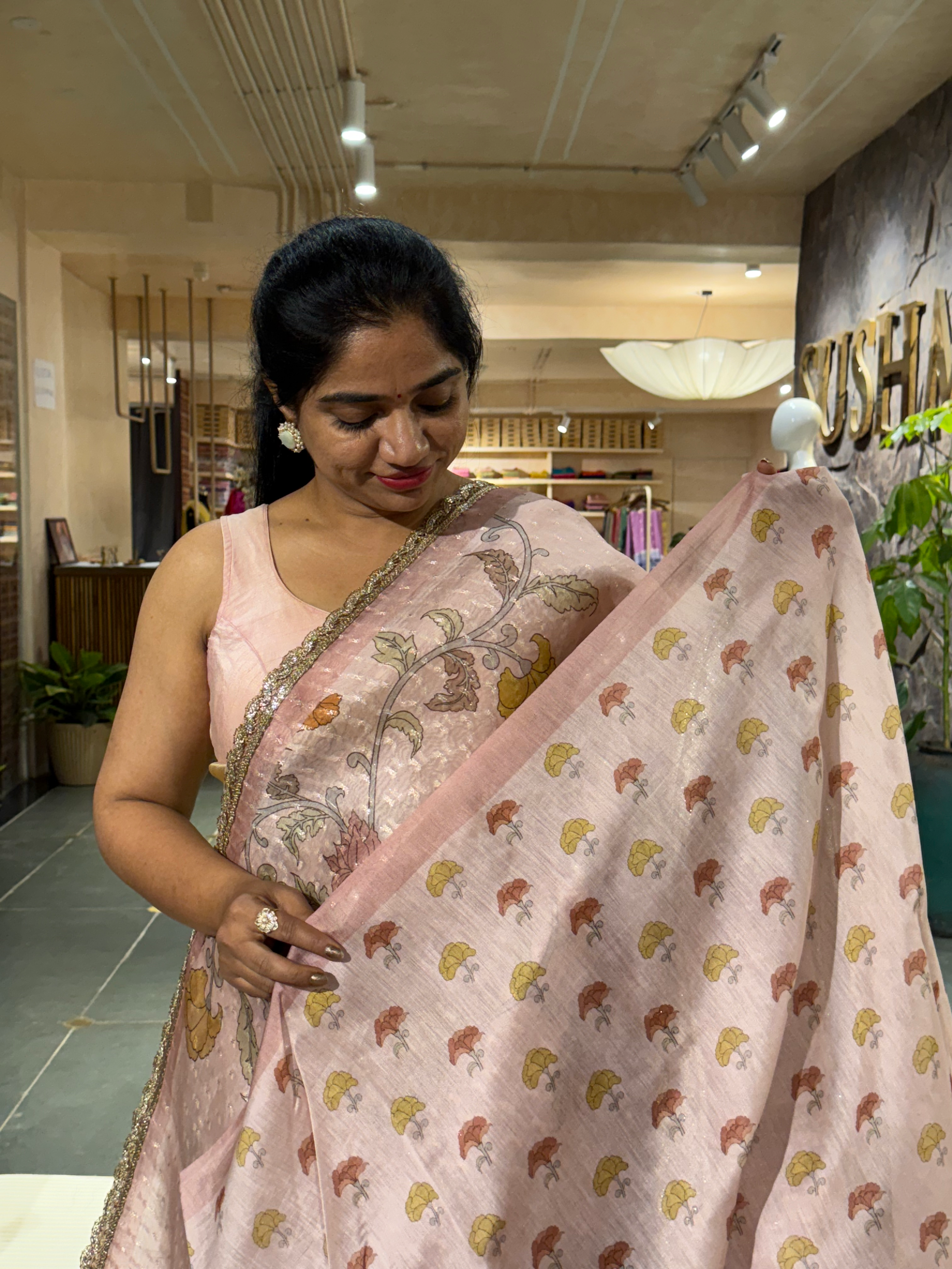 Dusty Pink Pure Organza Saree with allover zari butis and floral print paired wi