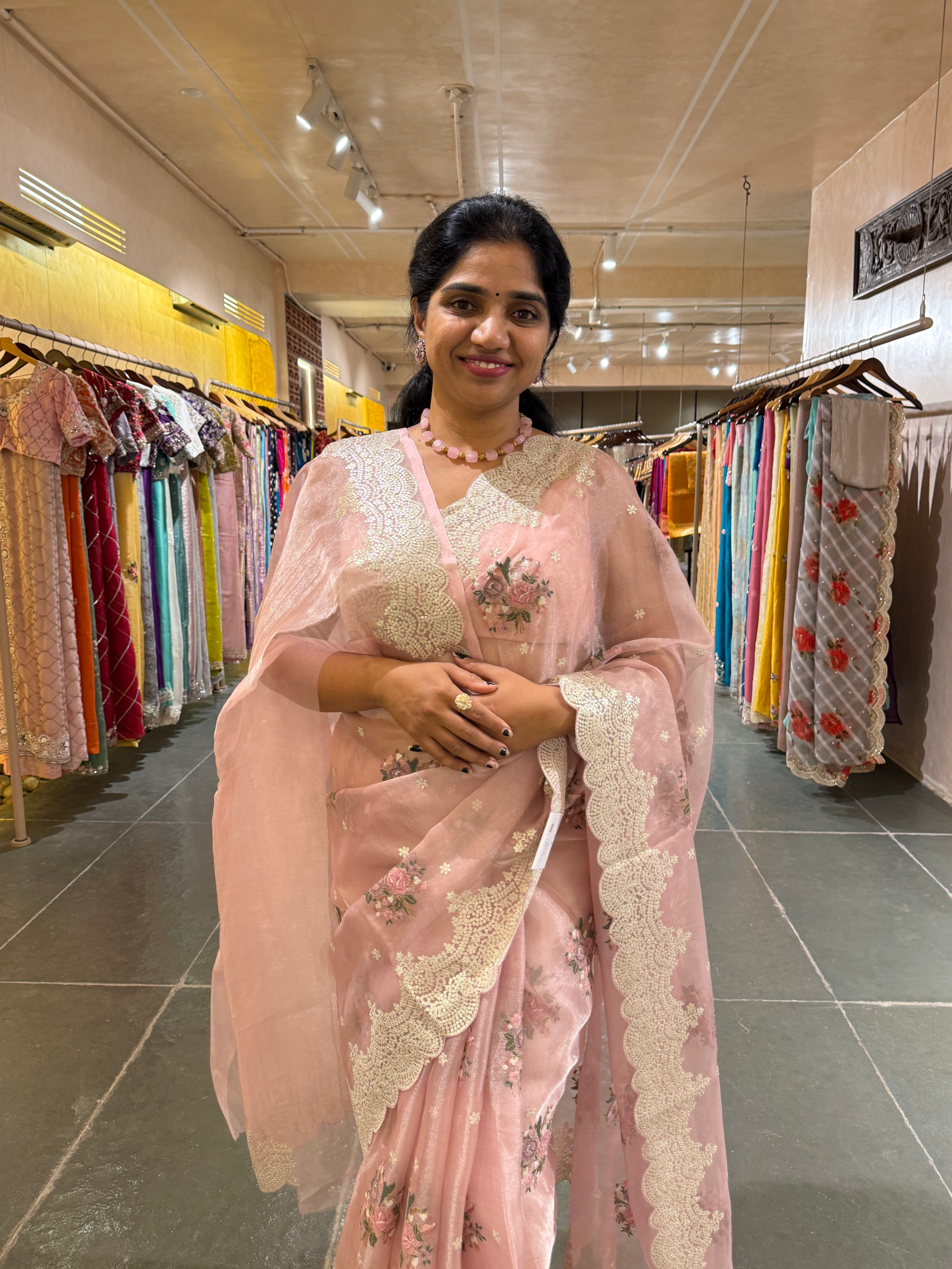 Pink Tissue Saree With allover Petite Point Motifs & Pittai Sequnce Borders
