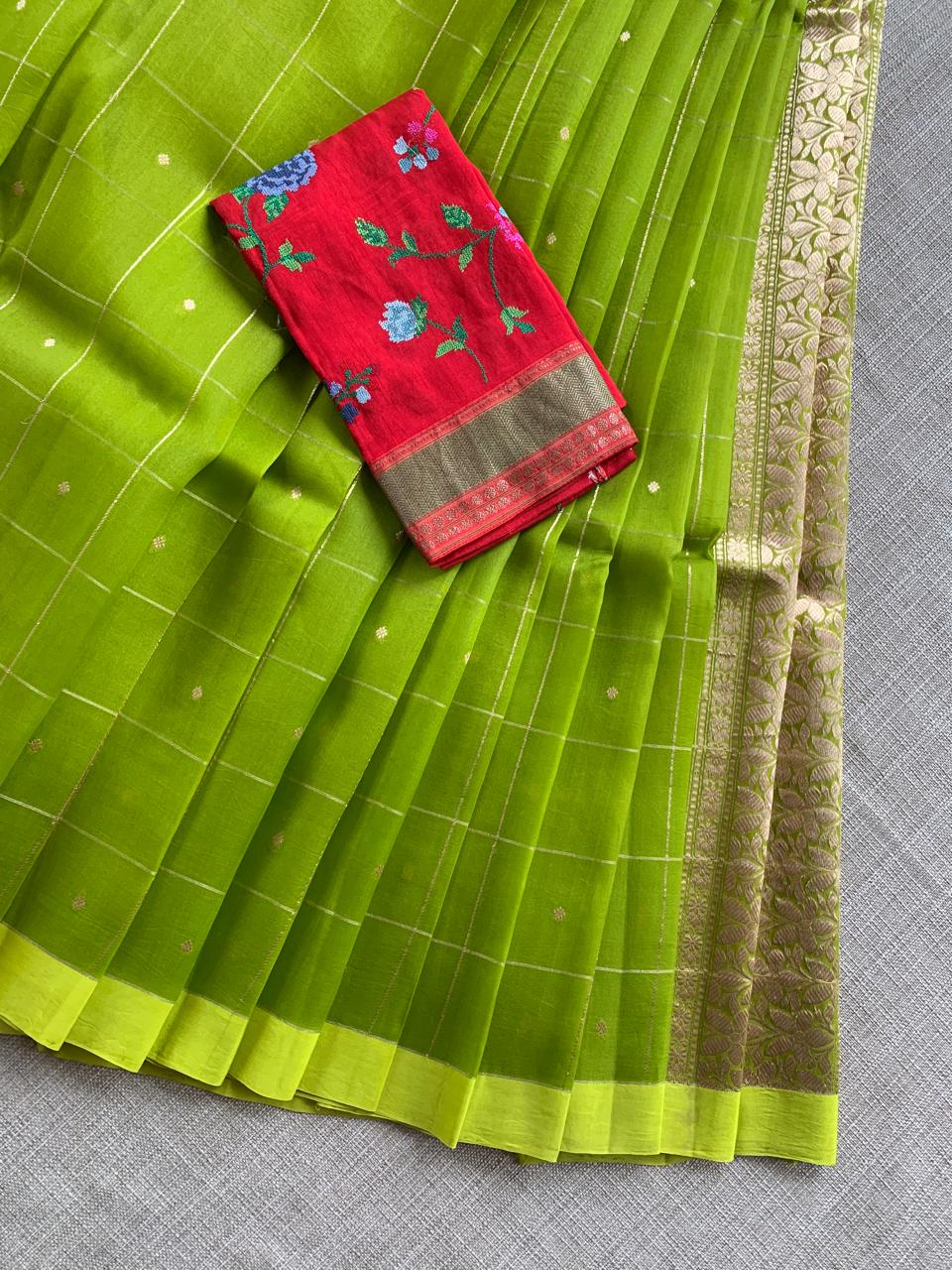 Parrot Green Handloom Banarasi Kora Checks Saree with Kaduwa Woven Zari Motifs .