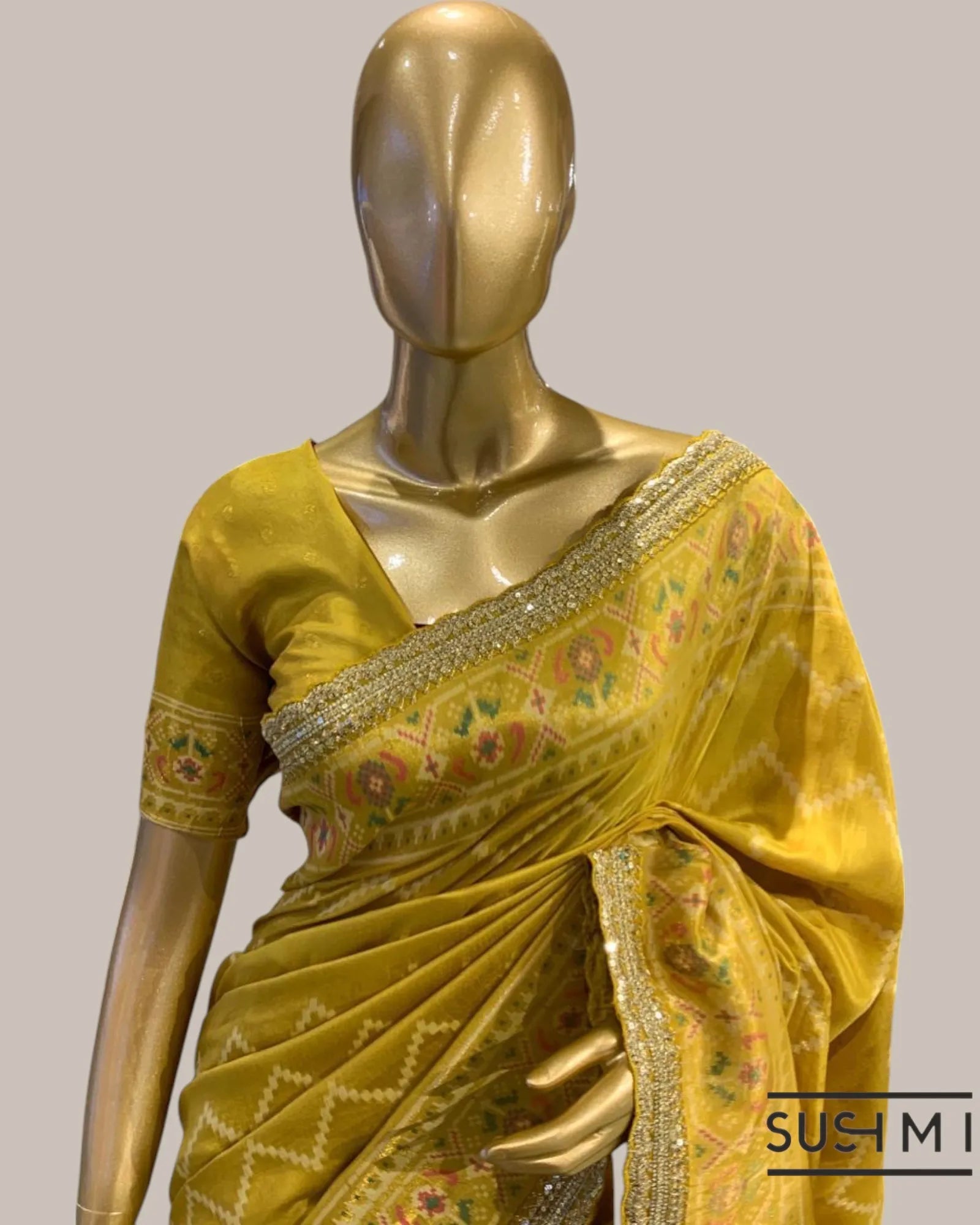 Mustard Tussar Silk Gorgette Saree in Ikkath Patola style Chevron body and Patol