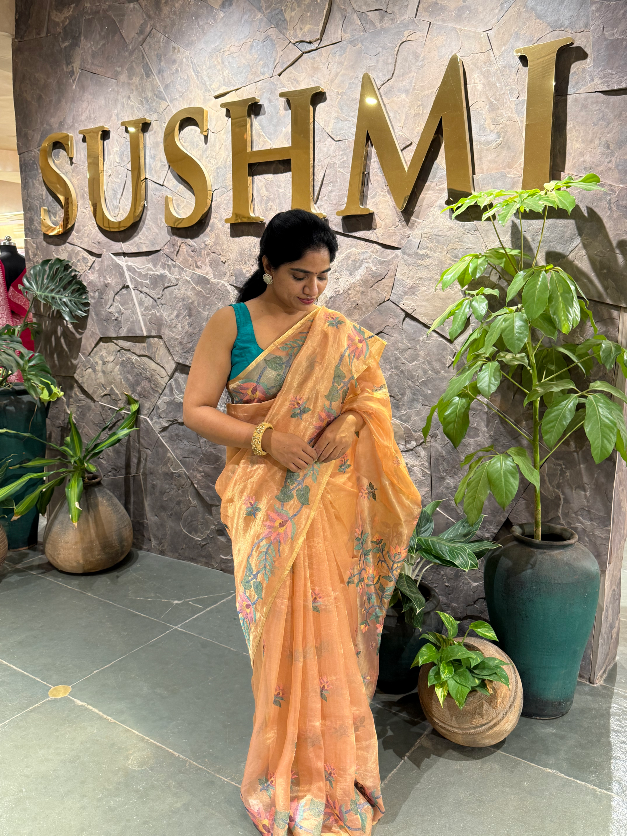 STJA207 : Peach Tissue With Jamdani Look Embroidery