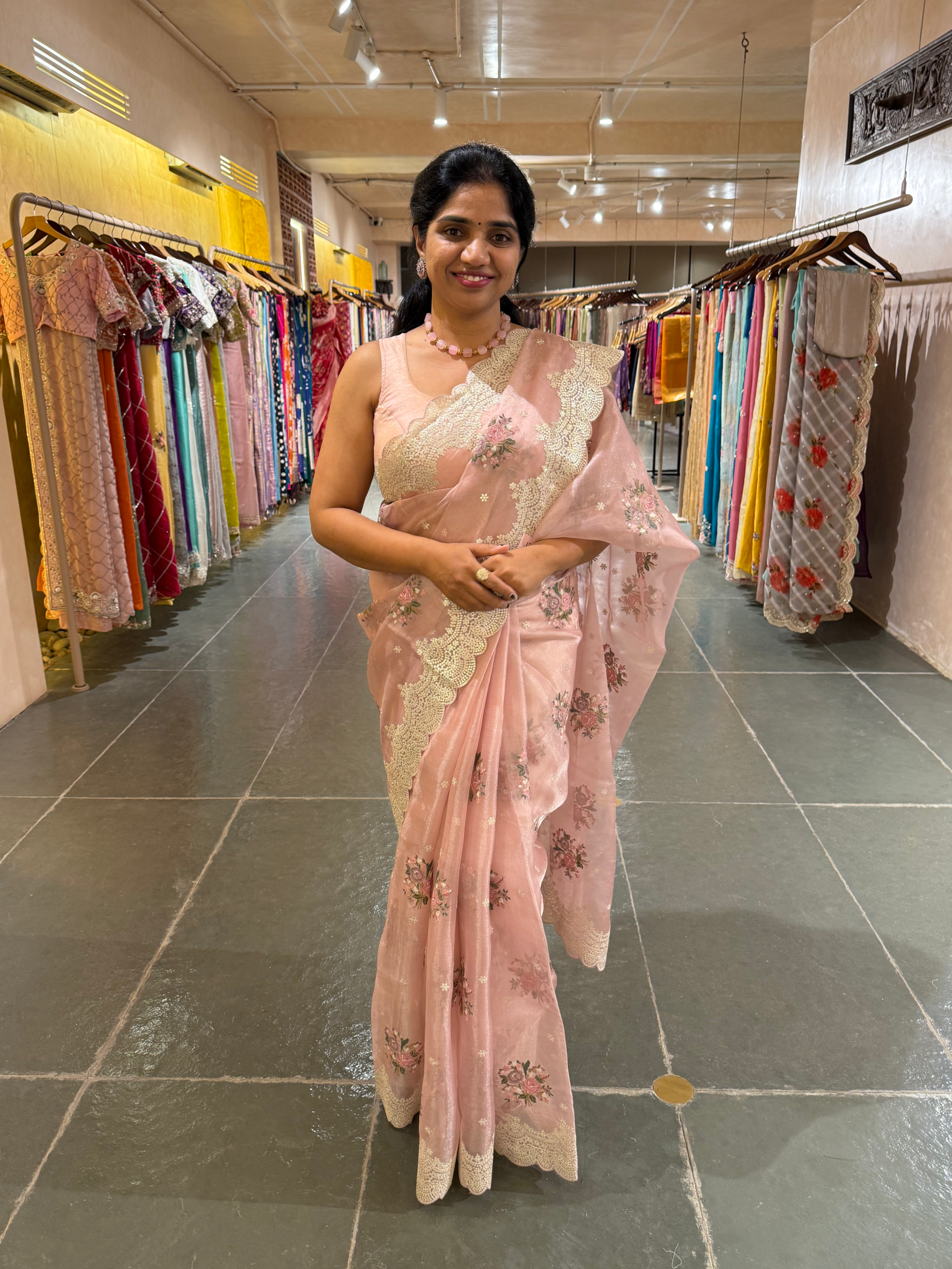 Pink Tissue Saree With allover Petite Point Motifs & Pittai Sequnce Borders