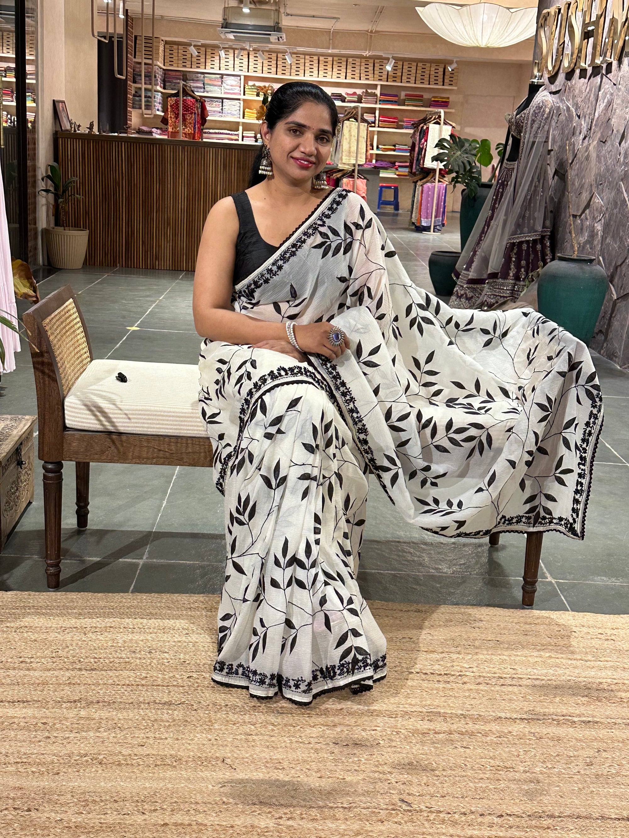 Half white crush Saree with allover applique work in leaf creeper pattern  and h