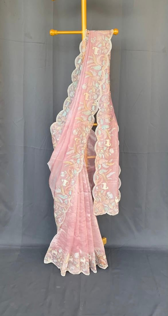Baby Pink Tissue Designer Saree with by heavy embroidered Borders  .