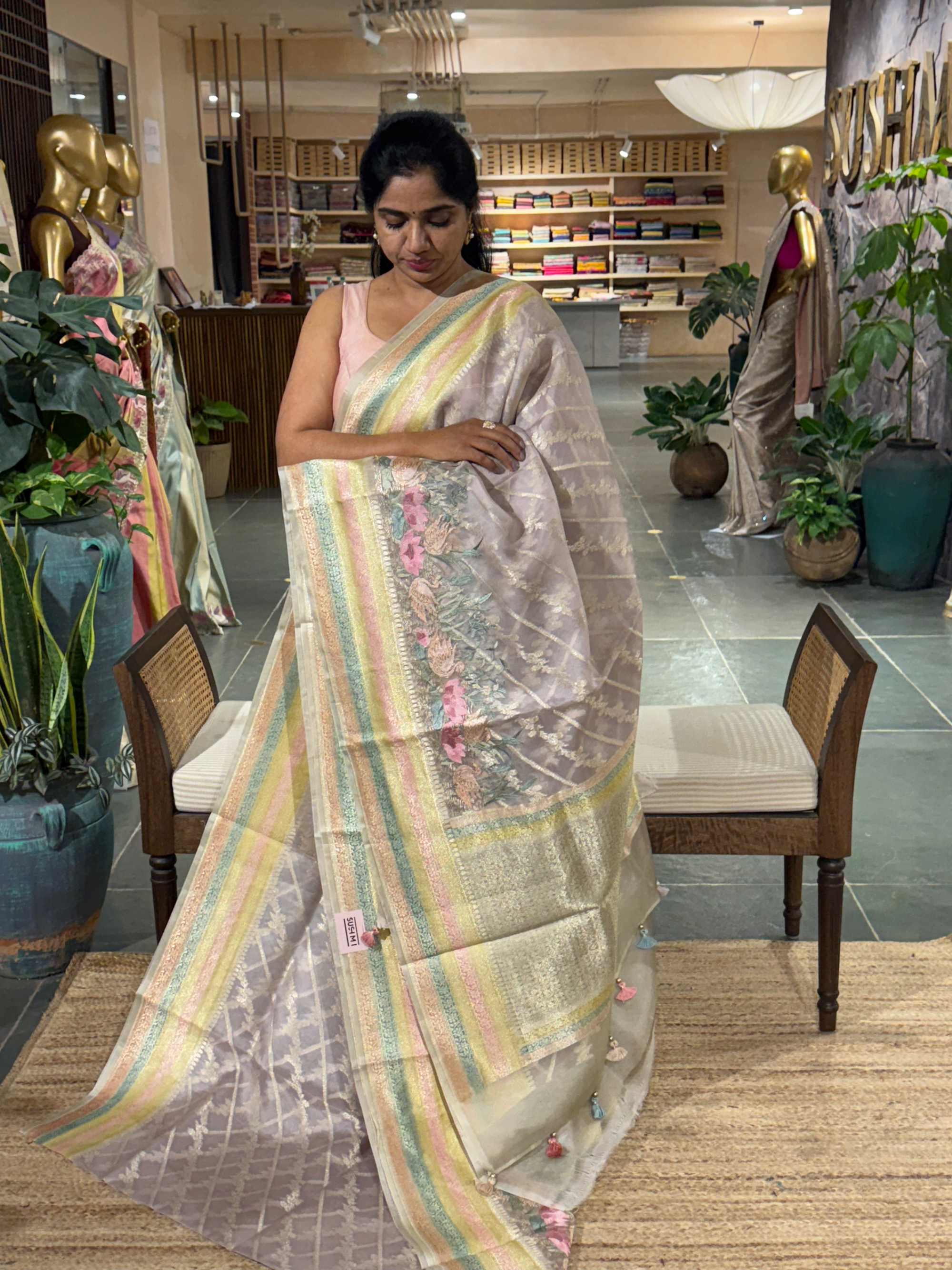 Pure Handloom Kora Banarasi with rangkaat and embroidered borders and blouse.