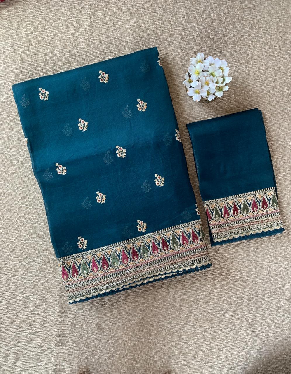 Luxe Peacock Blue Organza Saree with Sabyasachi-Inspired Border & Blouse