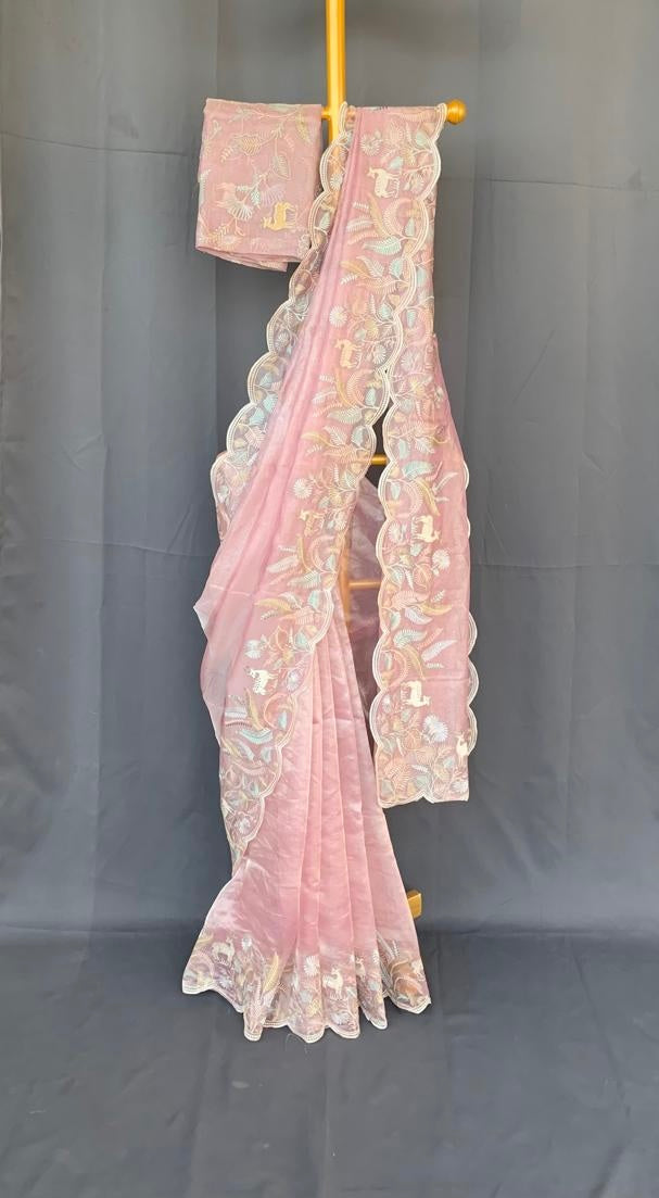 Baby Pink Tissue Designer Saree with by heavy embroidered Borders  .
