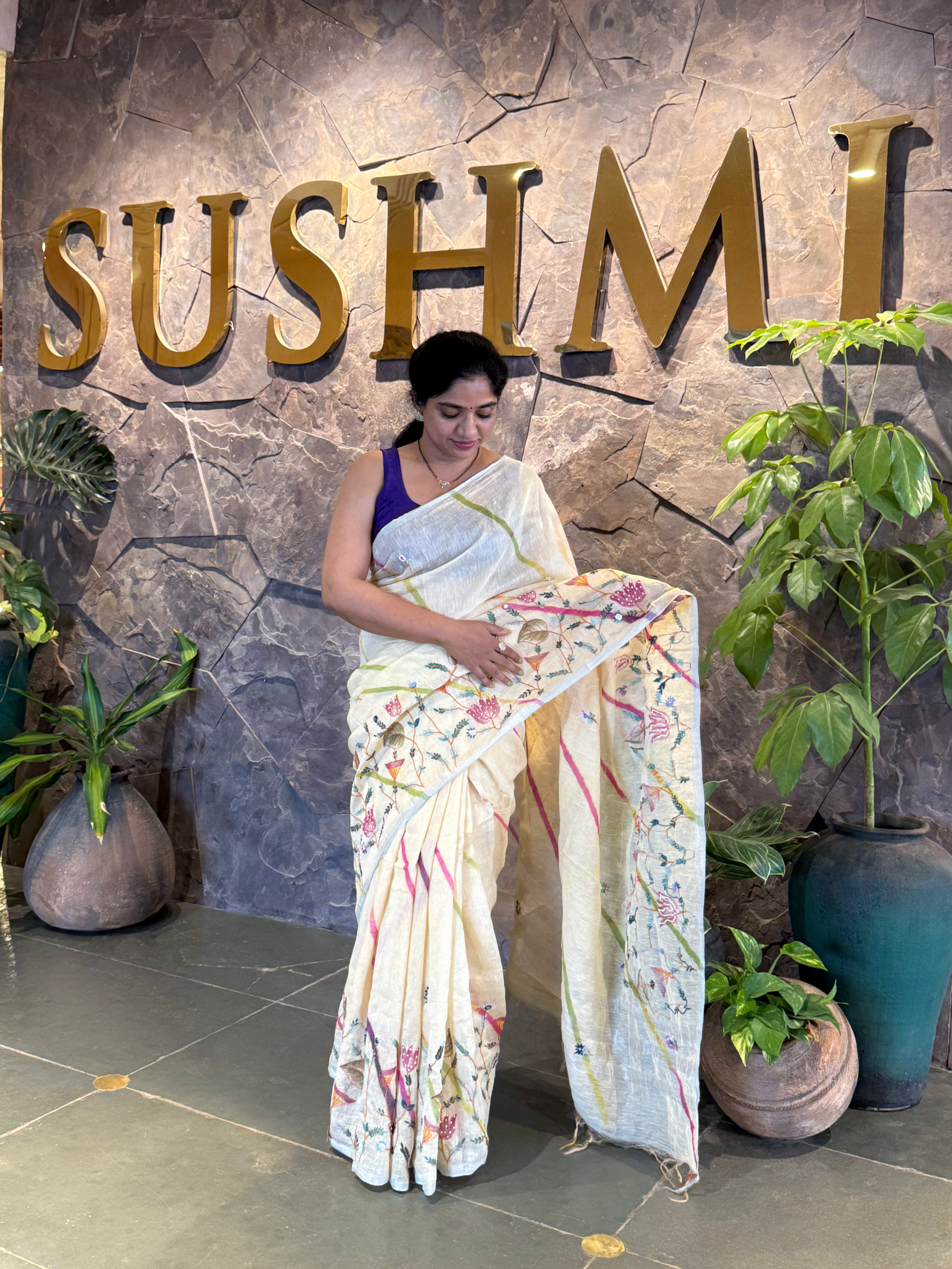 Lenin silk Saree with hanpainted border hightlighted with handwork
