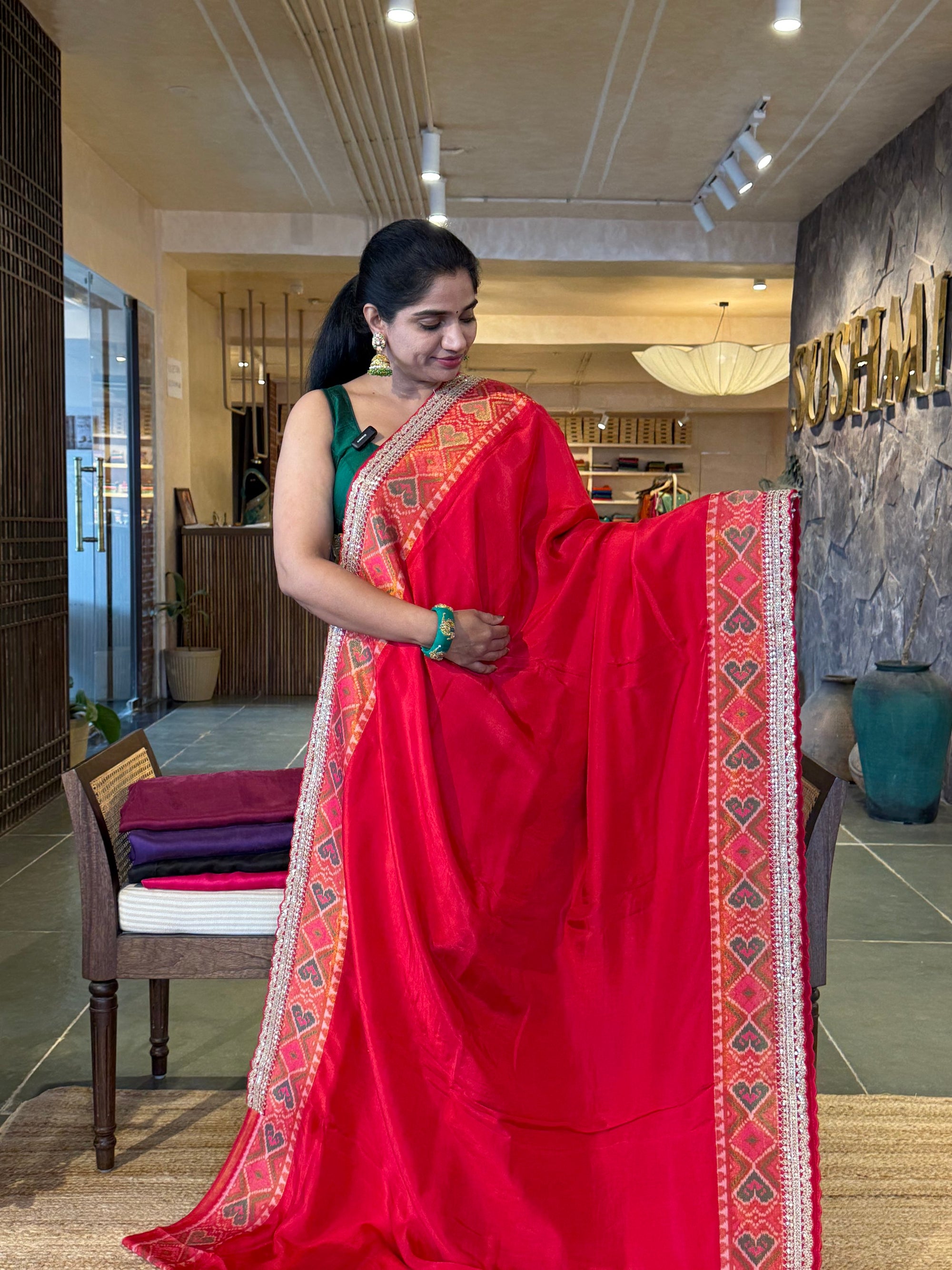 Chilli Red falling Tussar silk saree with Patola borders and Sabhyasachi-style