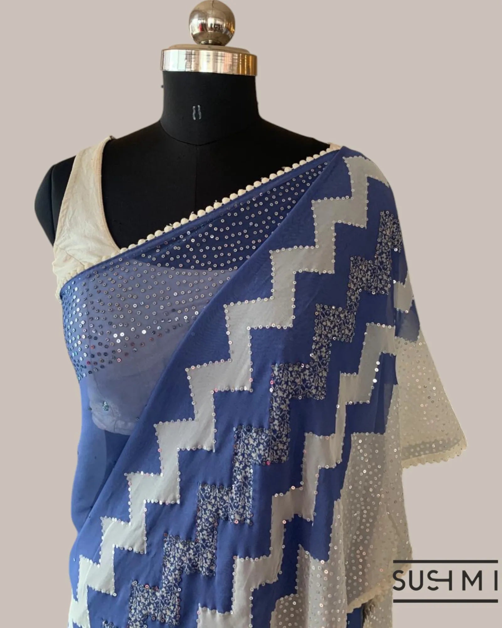 Blue Pure Gorgette Saree With Zigzag Pattern Sequnce Border