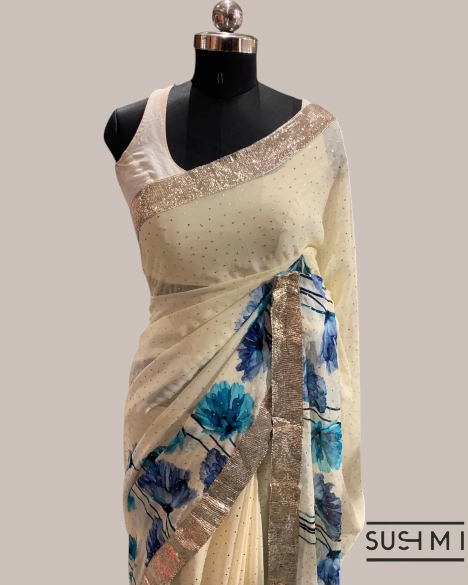 Pure Gorgette Saree with floral printed border and pallu hemlined with gota lace